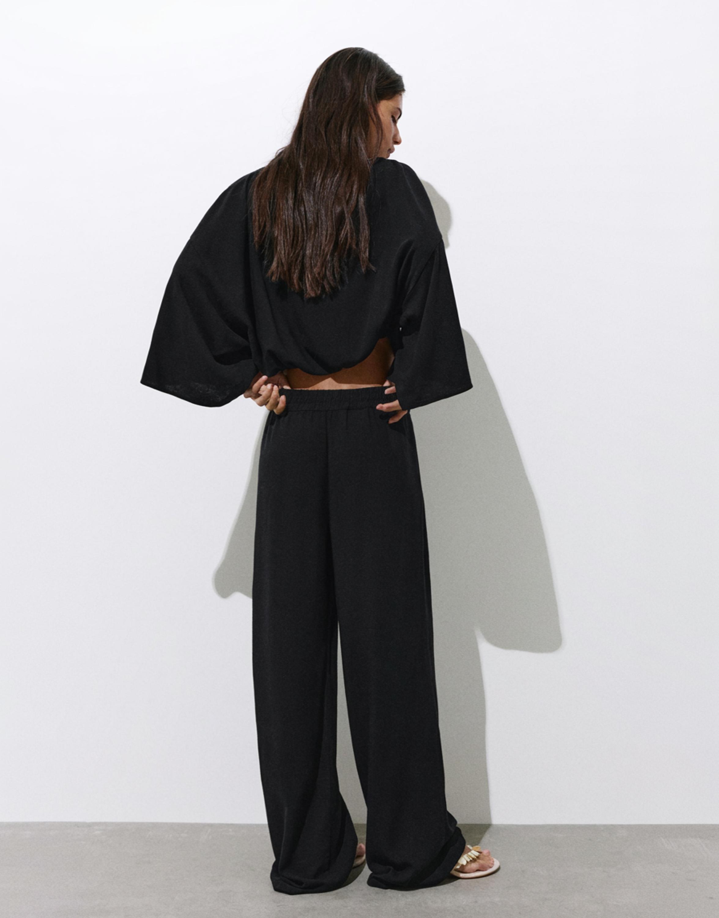 Flowing darted trousers — Black