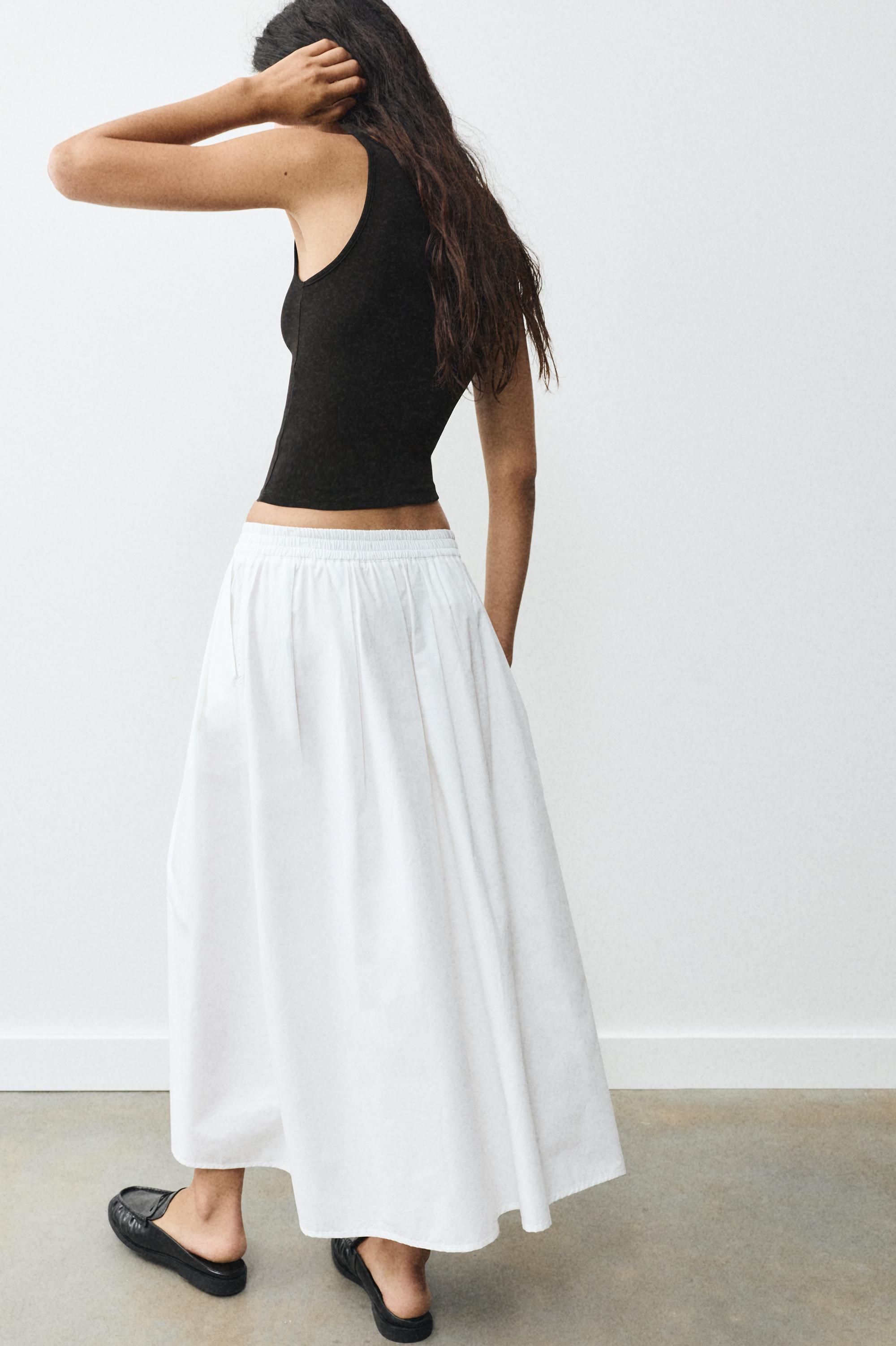 Boat neck tank top — Black