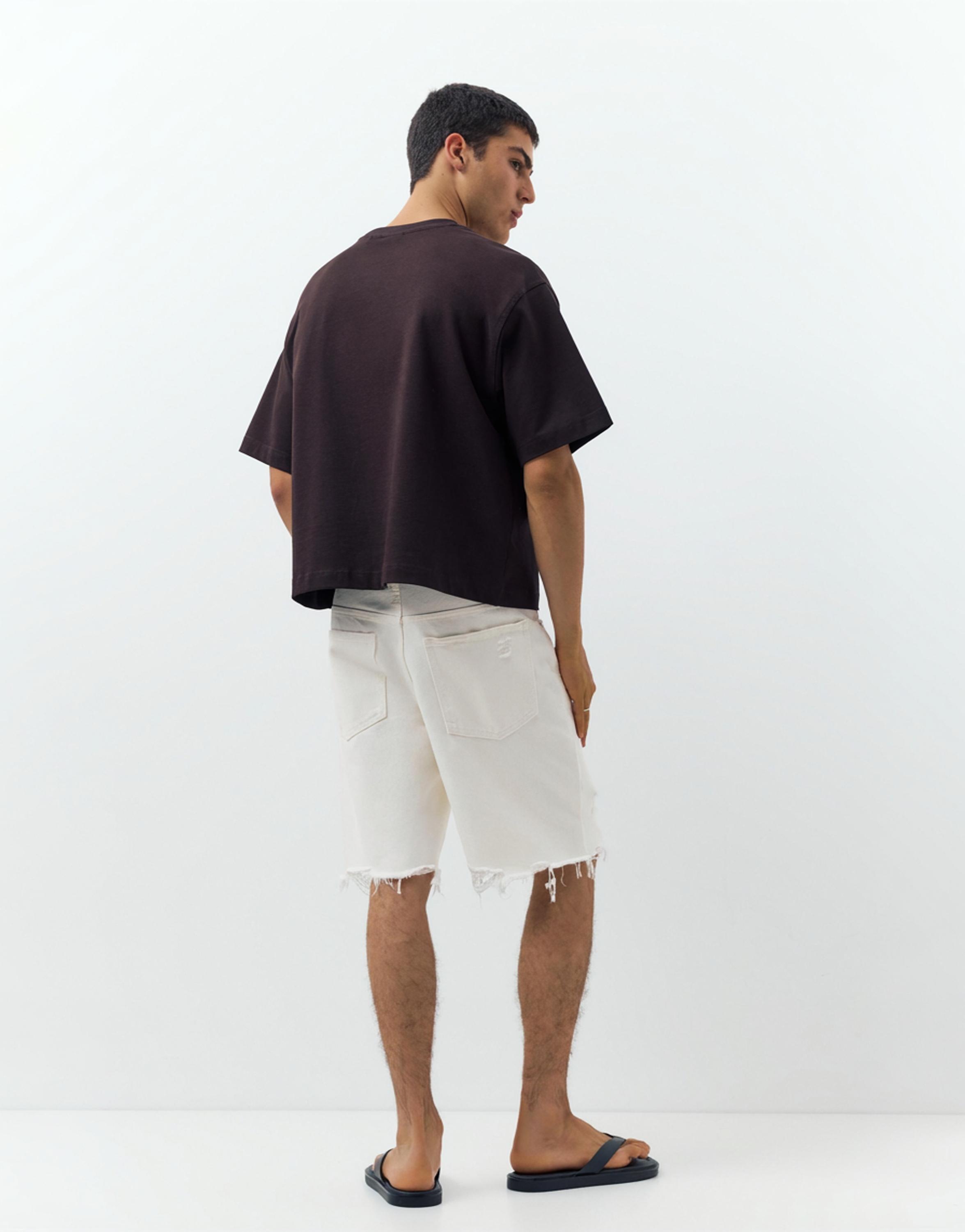 Straight-leg denim Bermuda shorts — Ecru