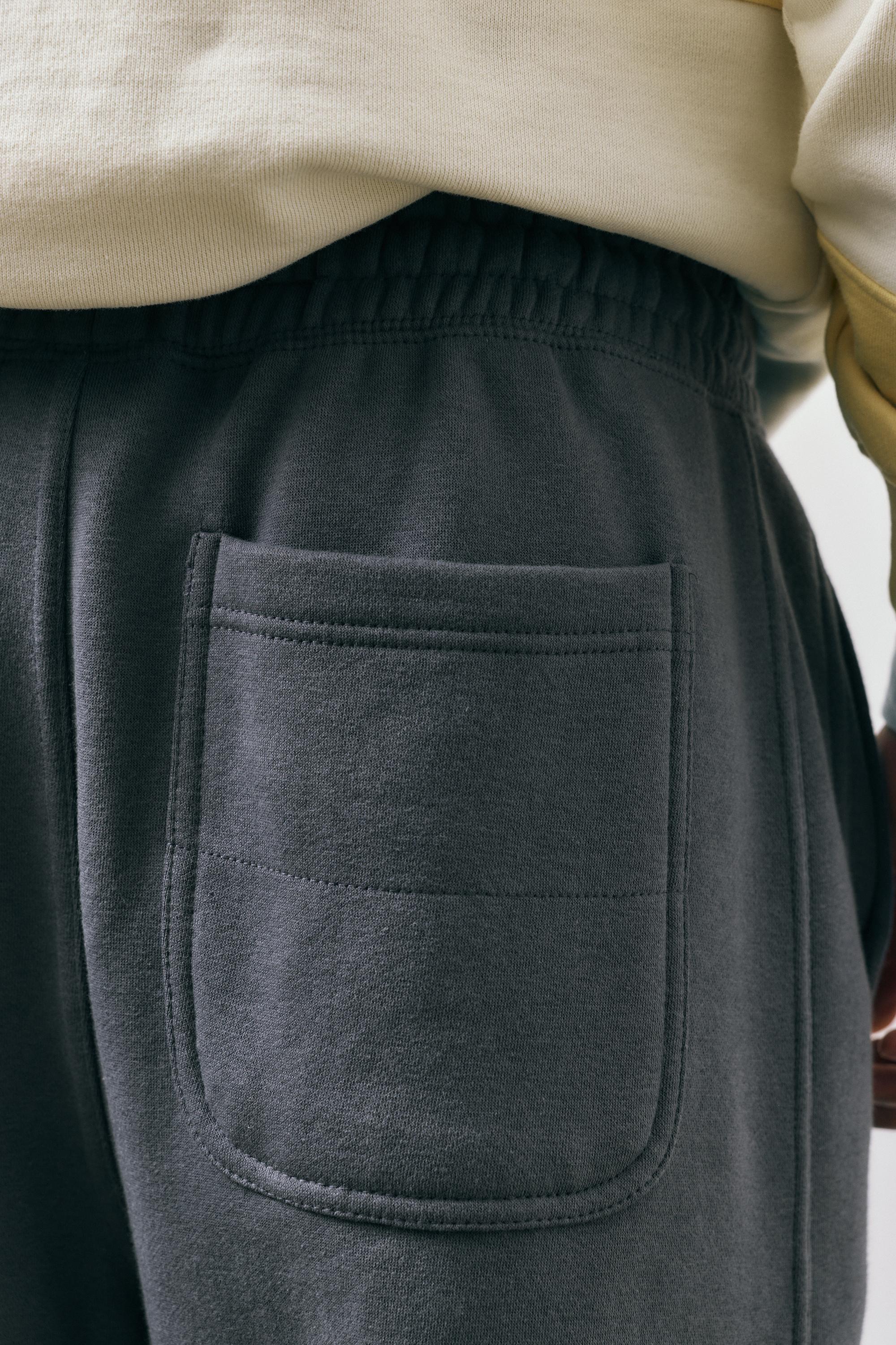 Basic baggy tracksuit bottoms — Grey blue