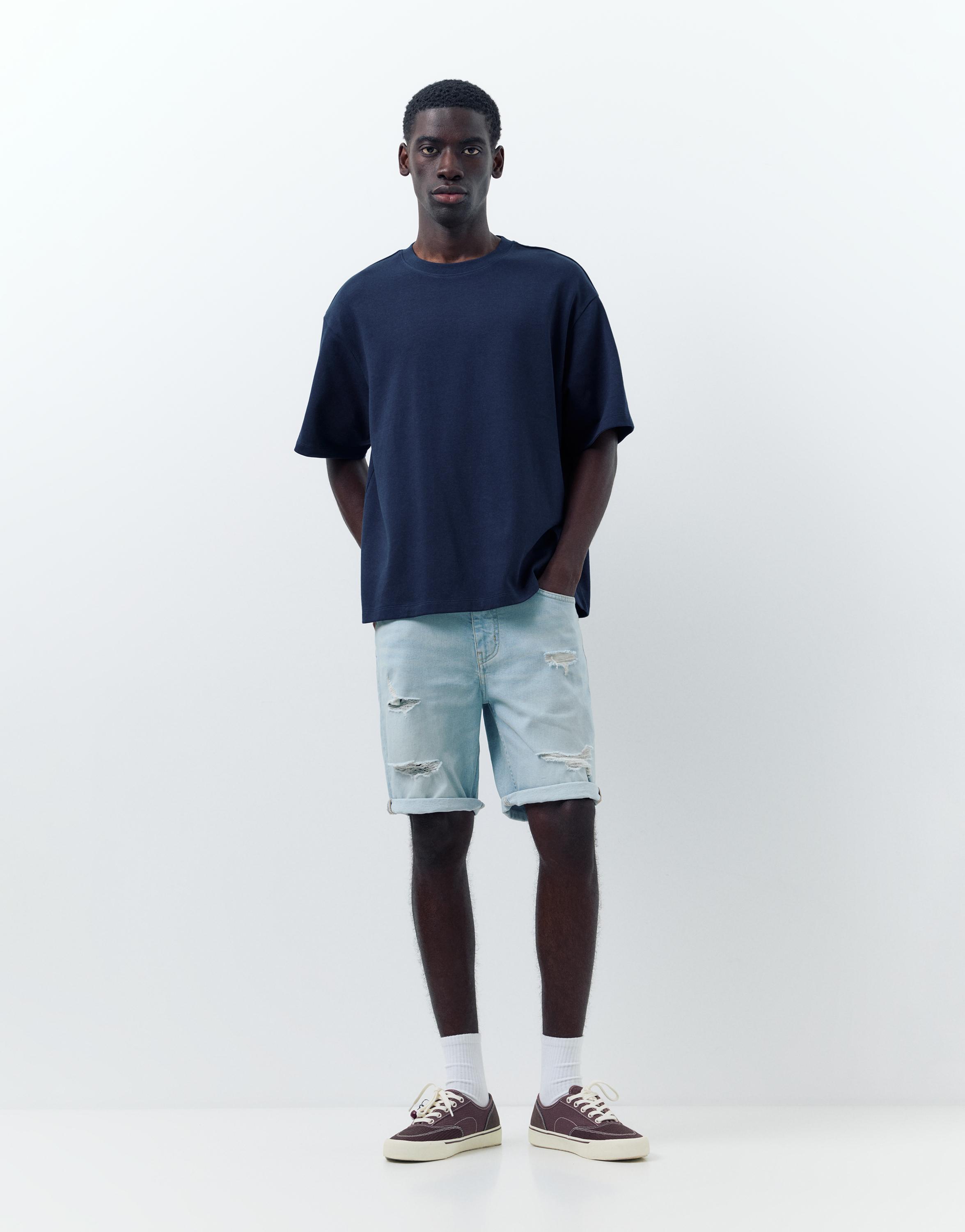 Ripped denim Bermuda shorts — Pale indigo