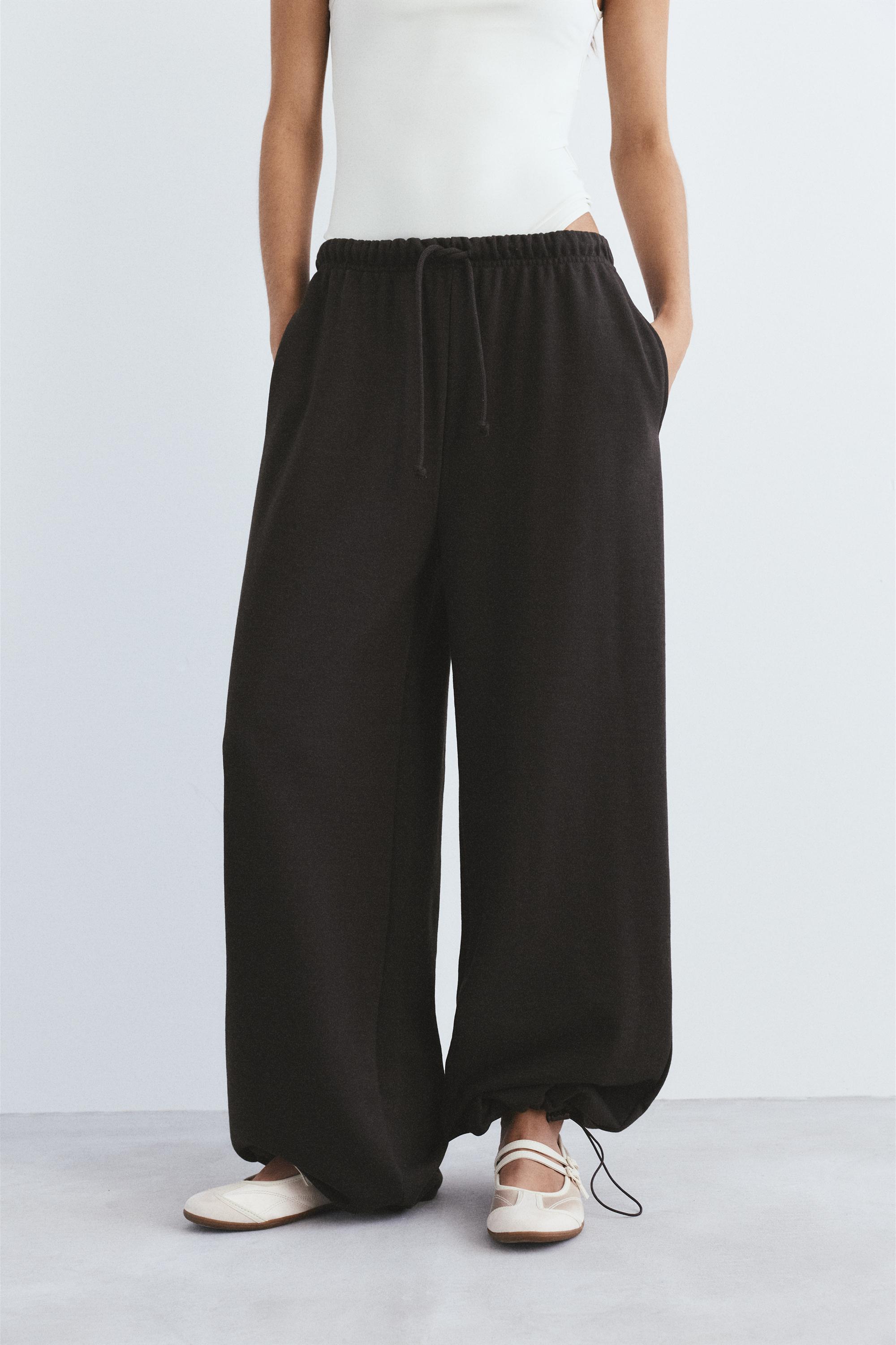 Wide-leg tracksuit bottoms with adjustable hem — Brown