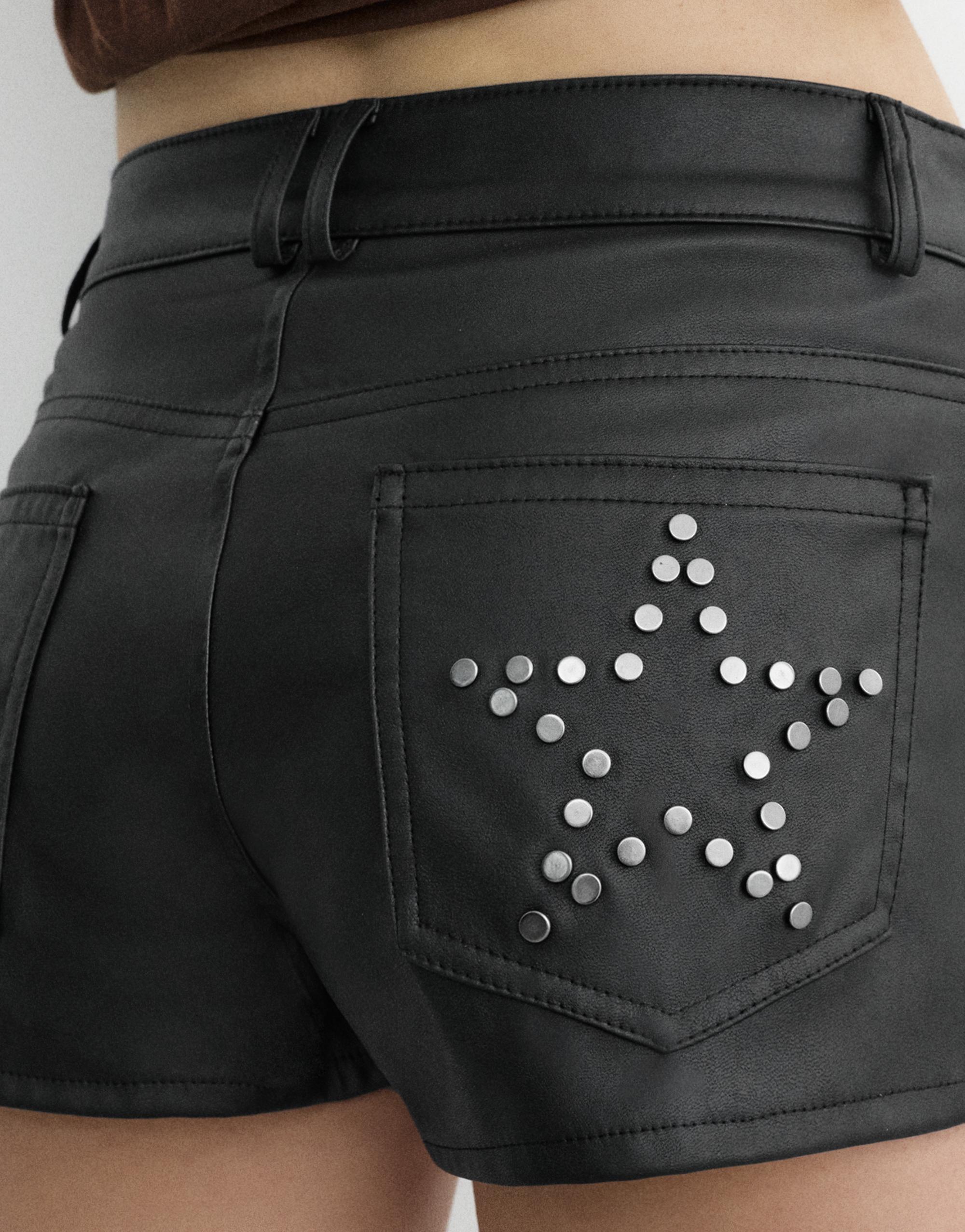 Studded faux leather mini shorts — Black