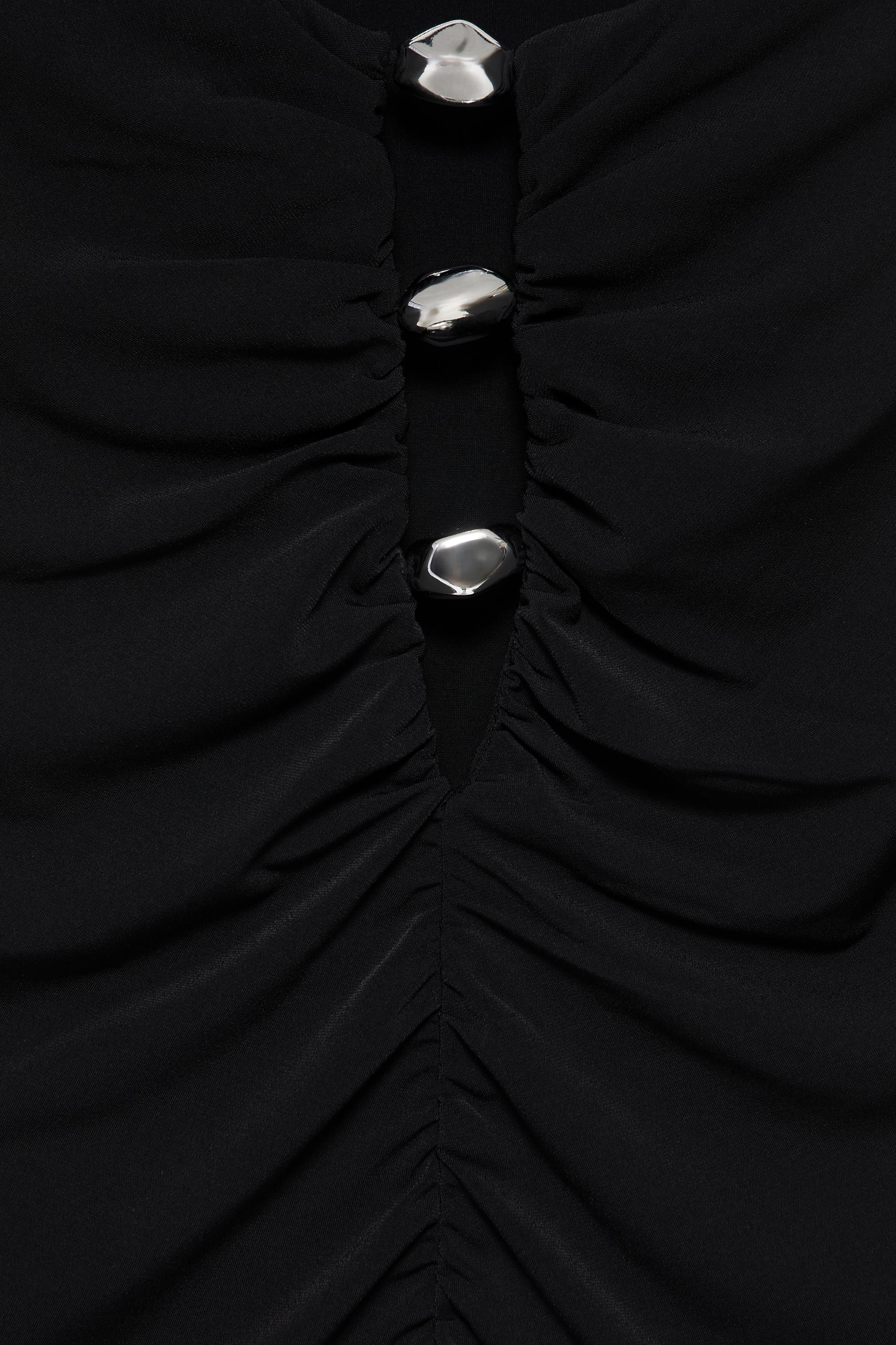 Cut-out embellished top — Black