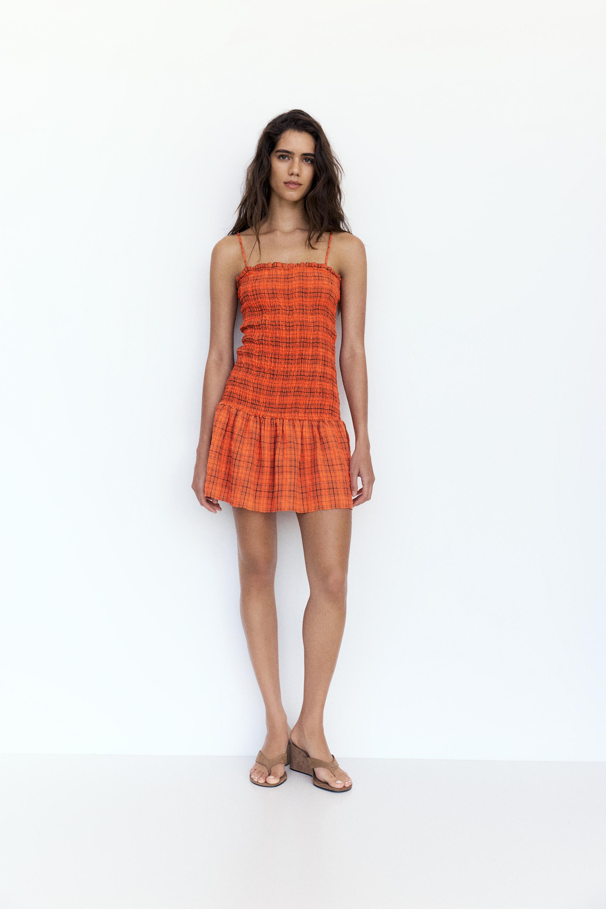 Check smocked dress — Red