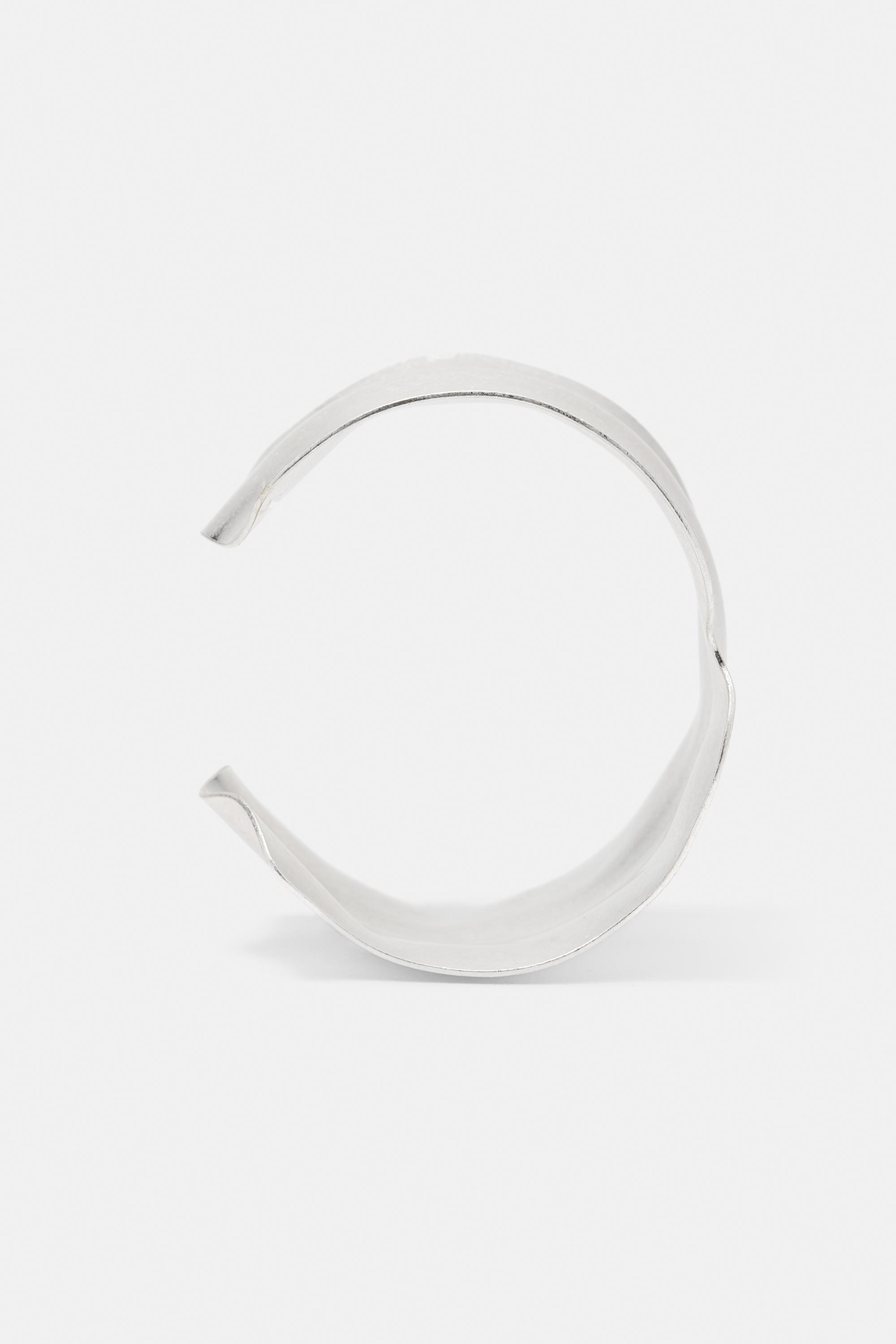 Irregular rigid arm cuff — Silver