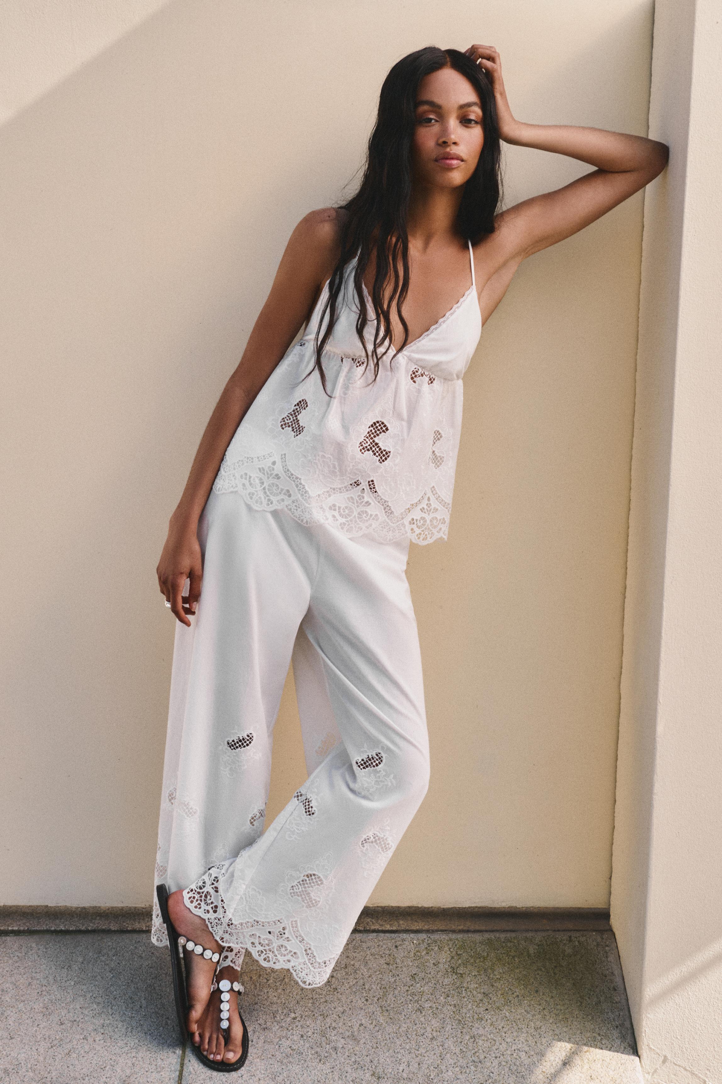 White trousers with Swiss embroidery — White