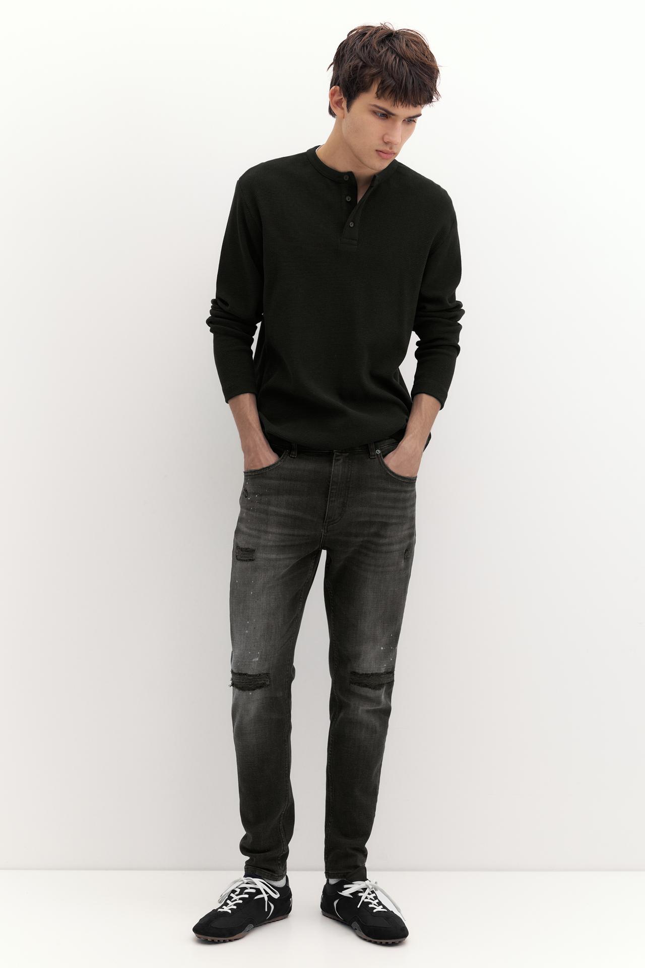 Paint splatter ripped skinny jeans — Faded black