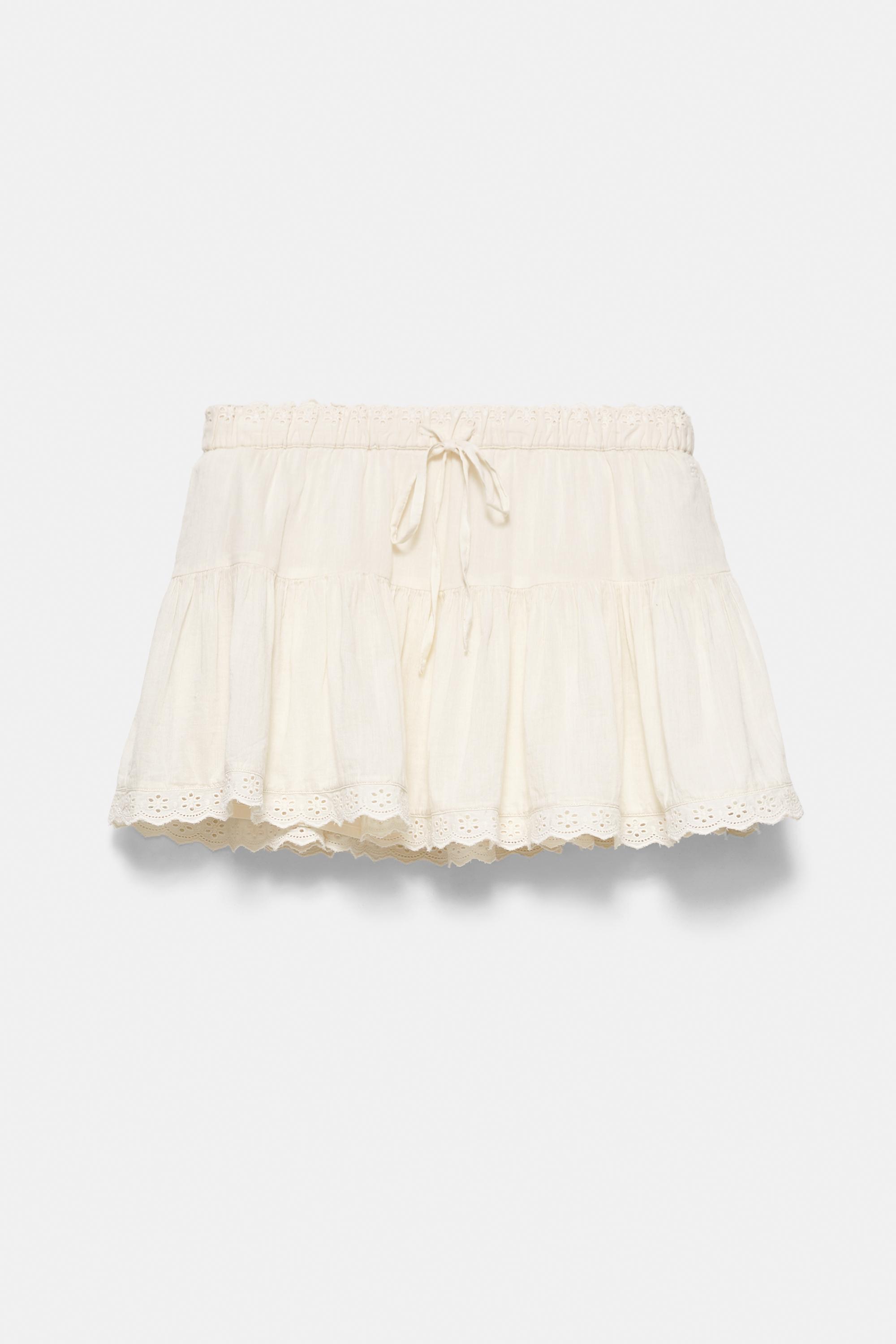 Ruffled mini skirt with lace trim — Beige