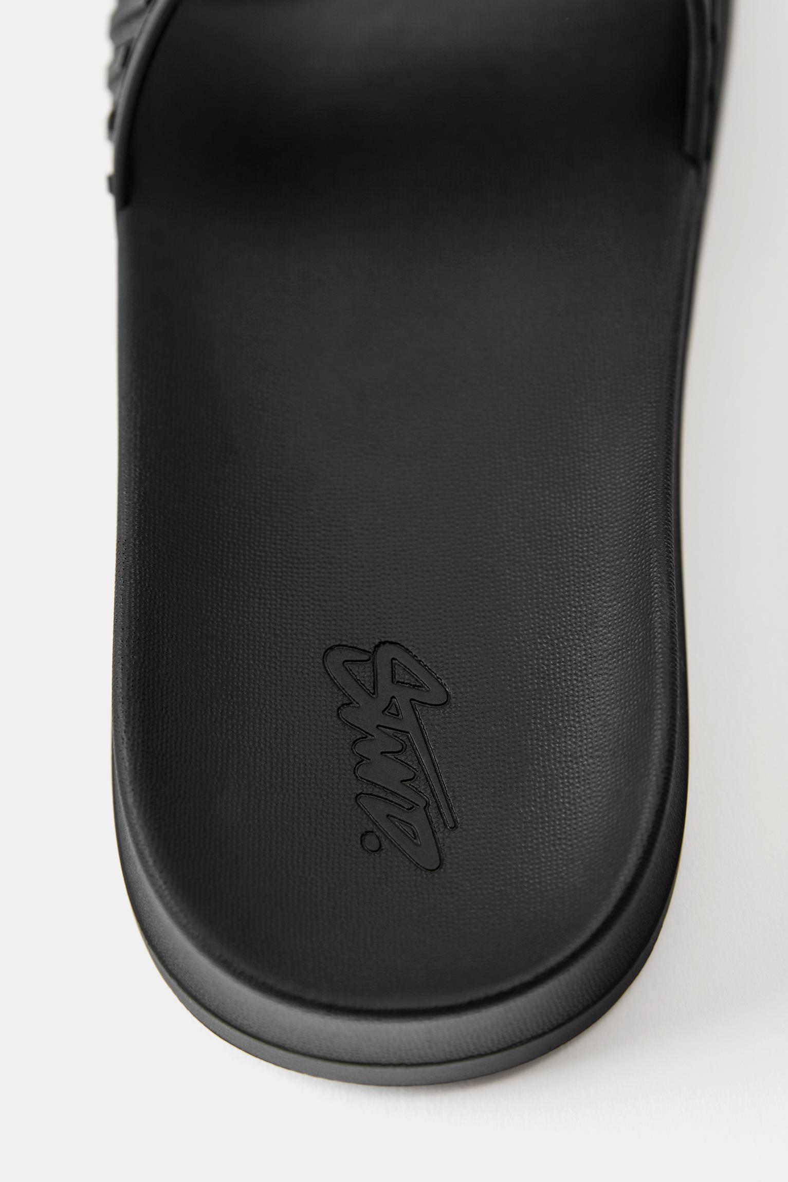 STWD rubberised sandals — Black
