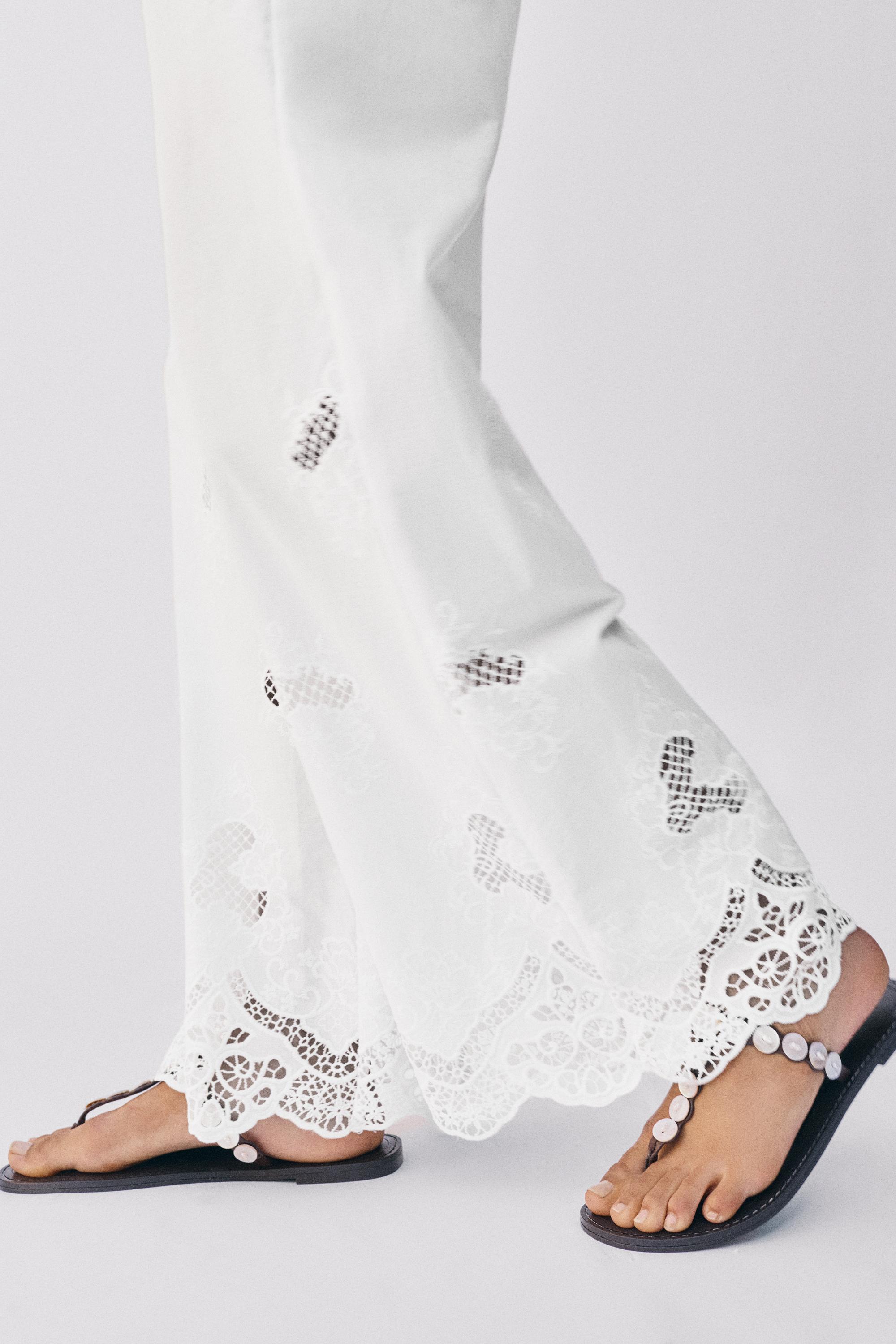 White trousers with Swiss embroidery — White
