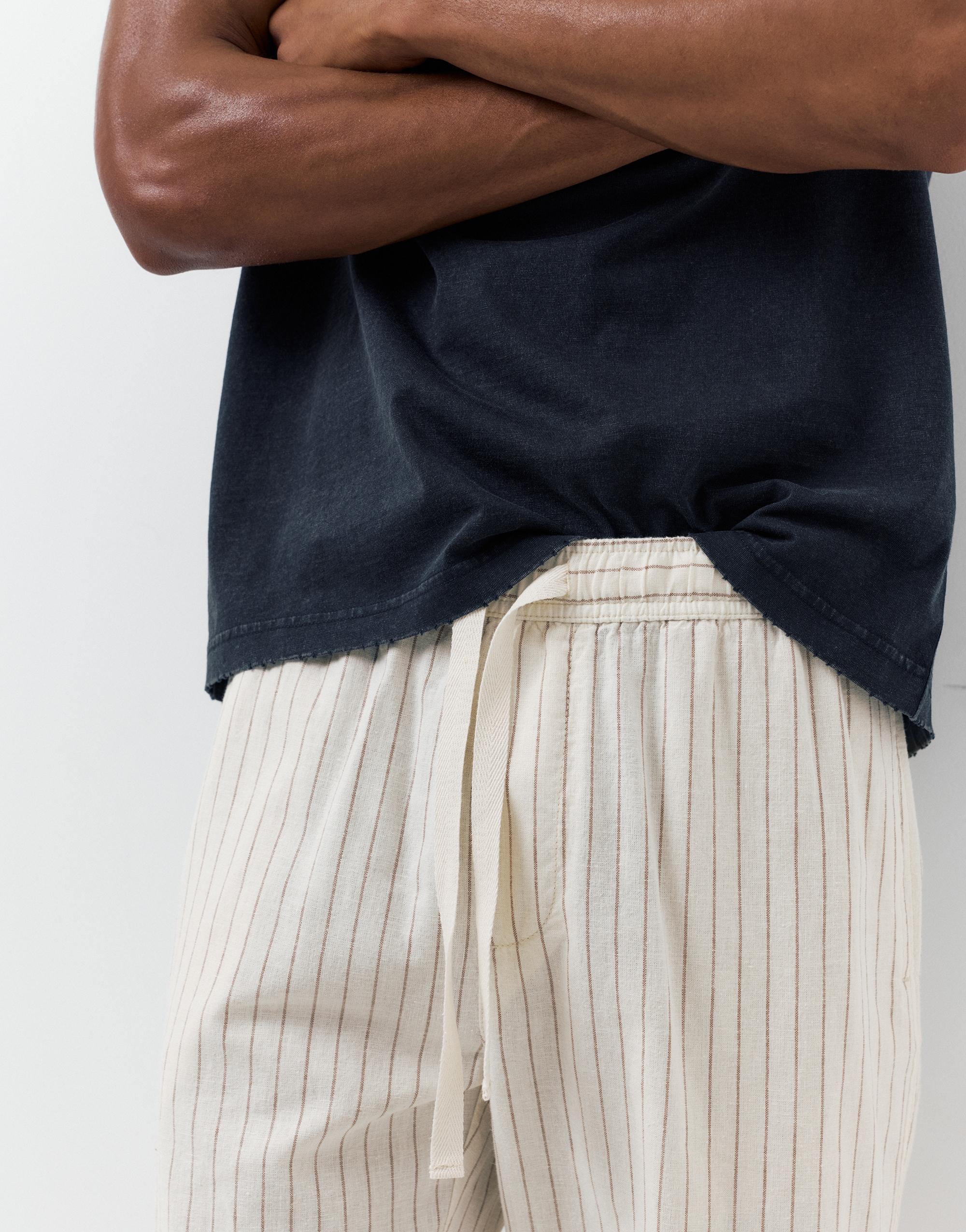 Linen blend jogger trousers — Striped