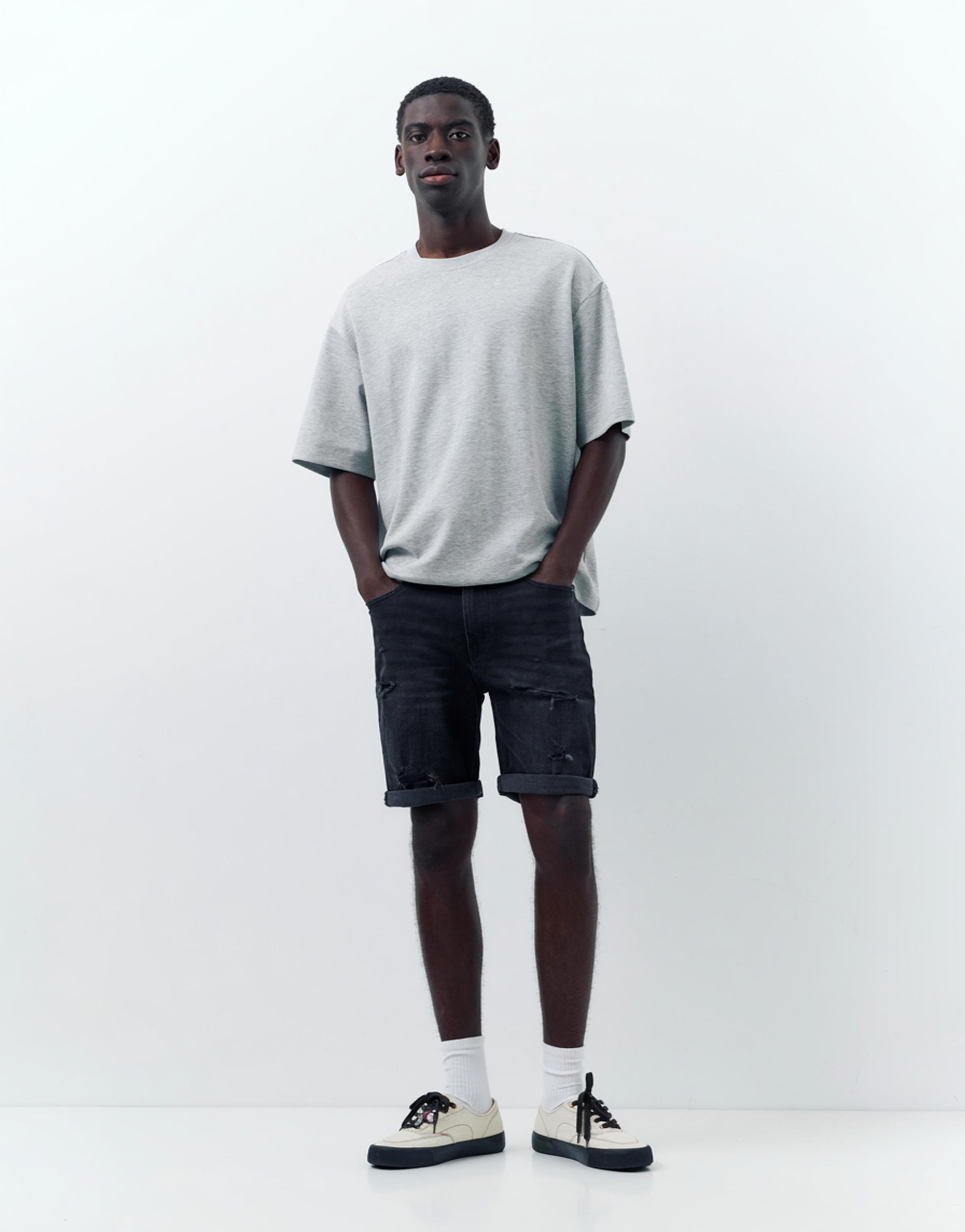 Ripped denim Bermuda shorts — Faded black