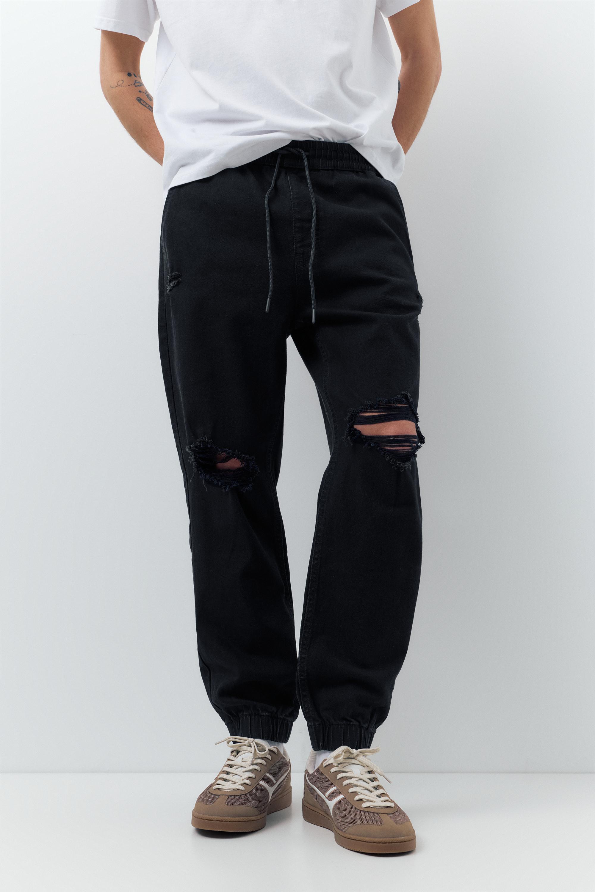 Ripped denim jogger trousers — Black