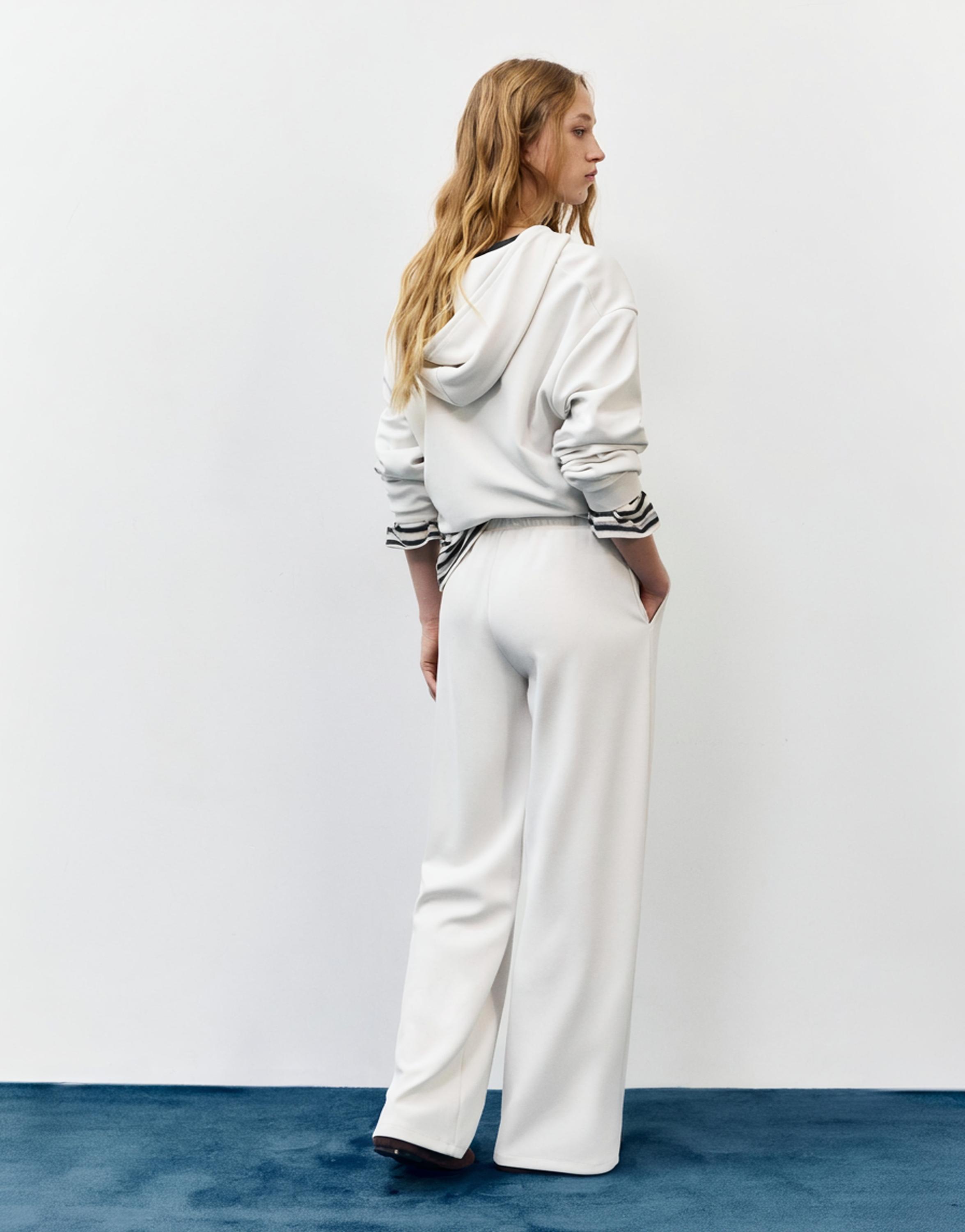Soft-touch wide-leg trousers — Ecru