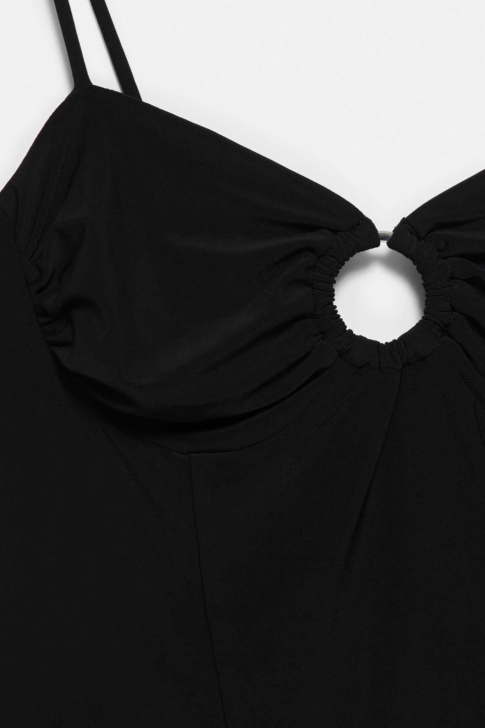 Strappy top with neckline appliqué — Black