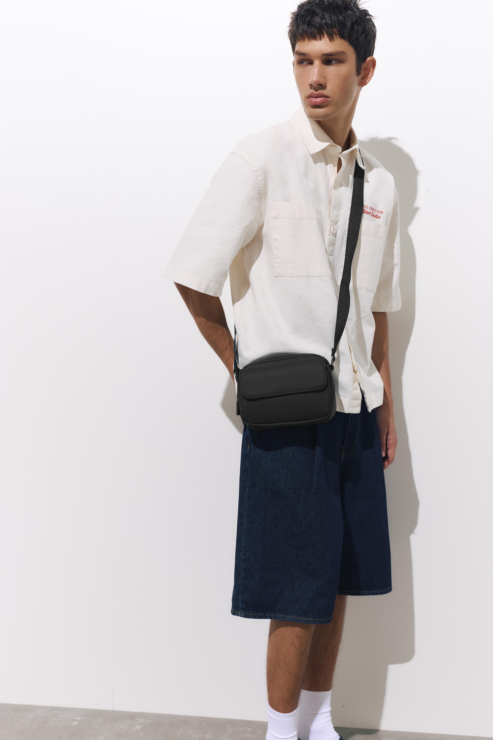 Rubberised crossbody bag — Black