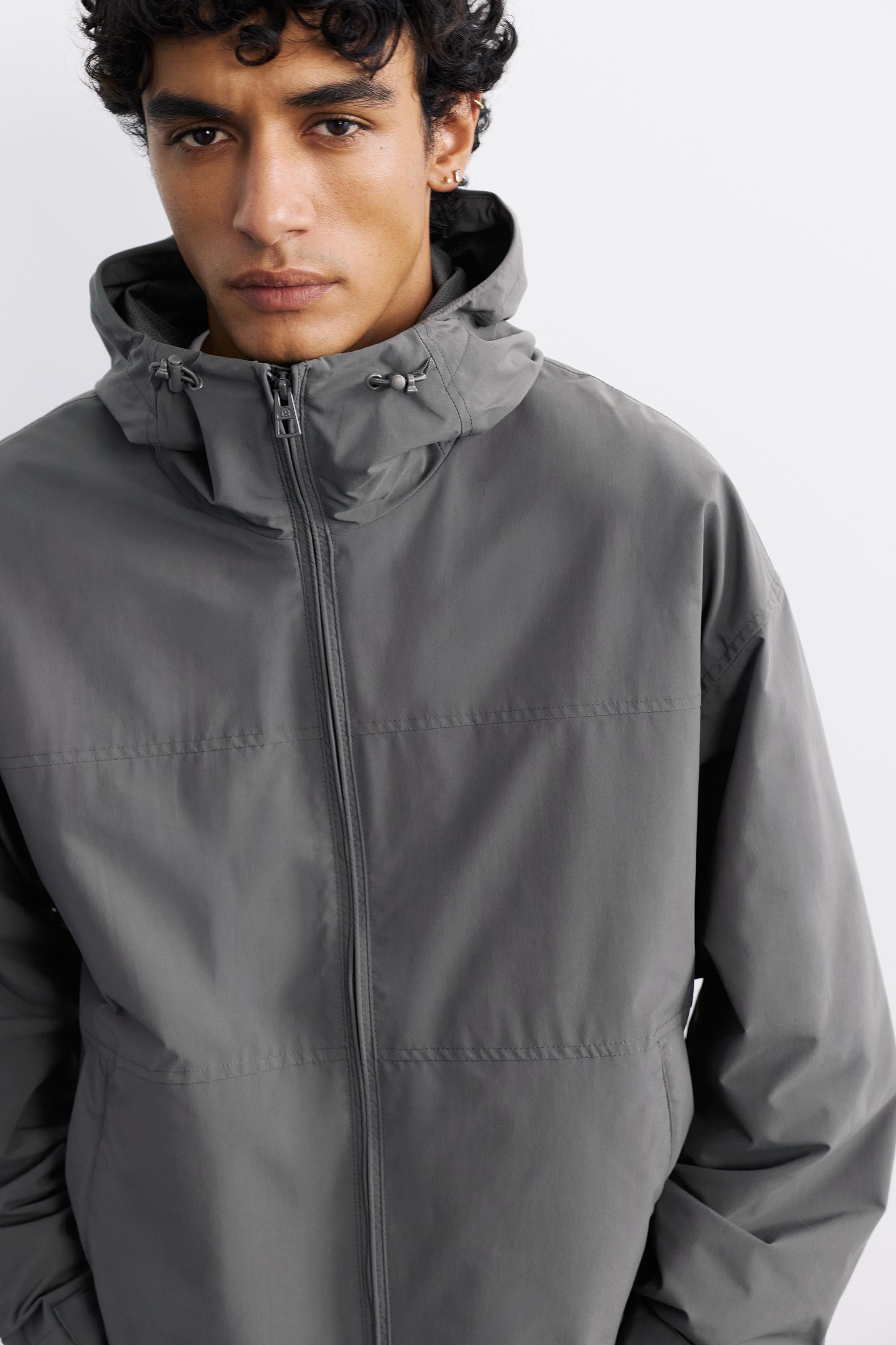 Lightweight hooded raincoat — Anthracite grey