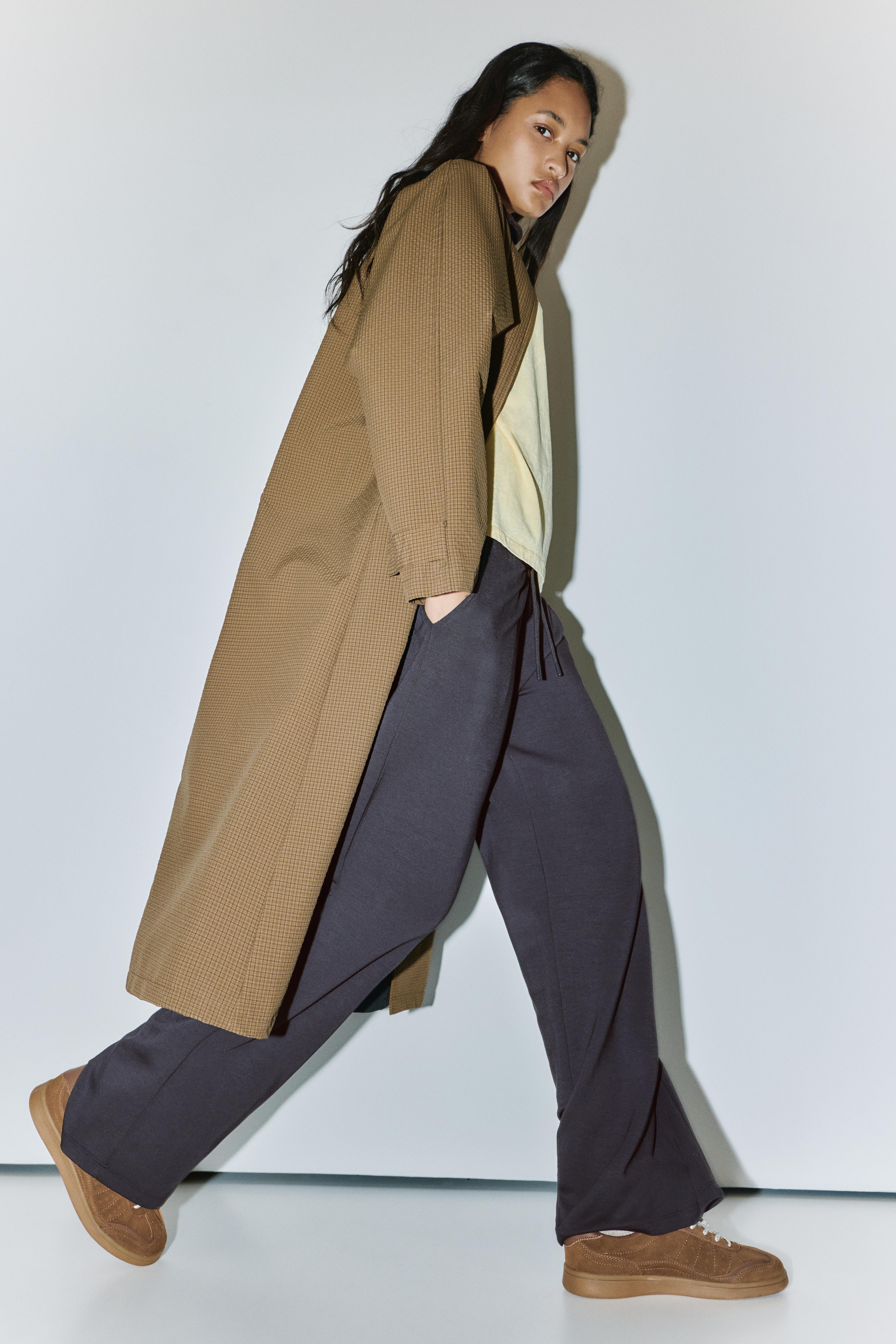 Soft-touch wide-leg trousers — Black