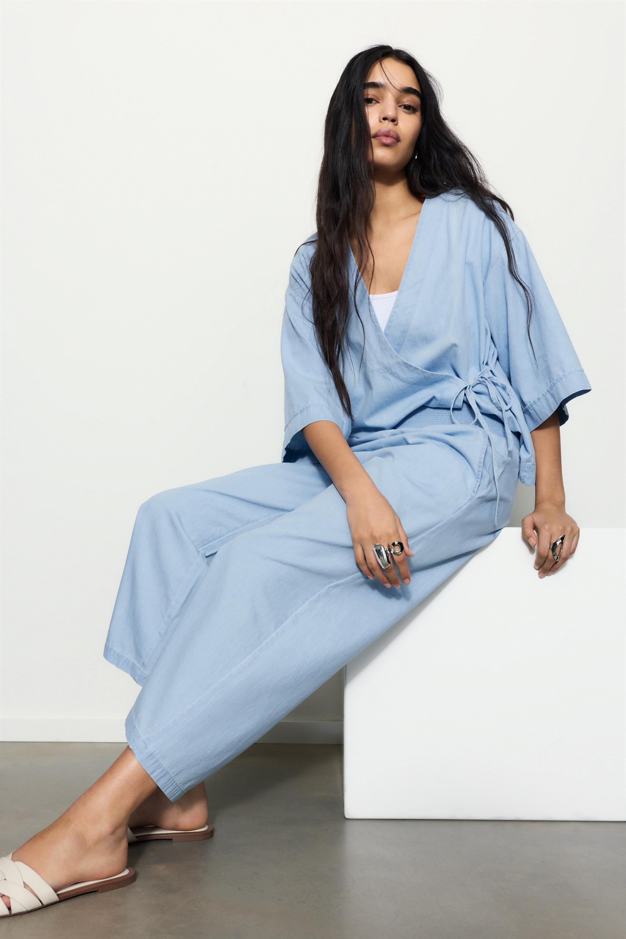 Flowing denim trousers with elasticated waist — Pale blue