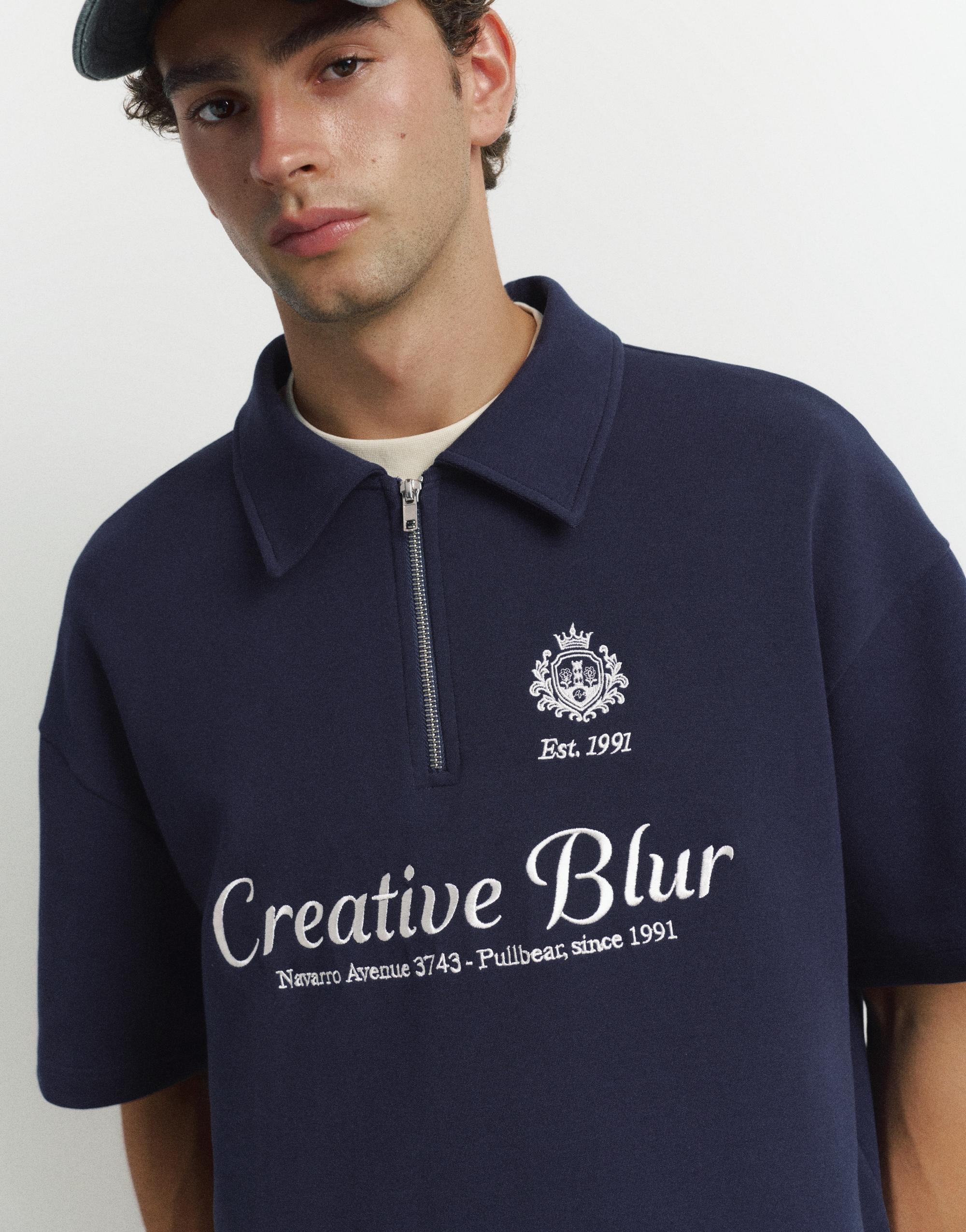 Interlock graphic polo shirt with zip — Navy