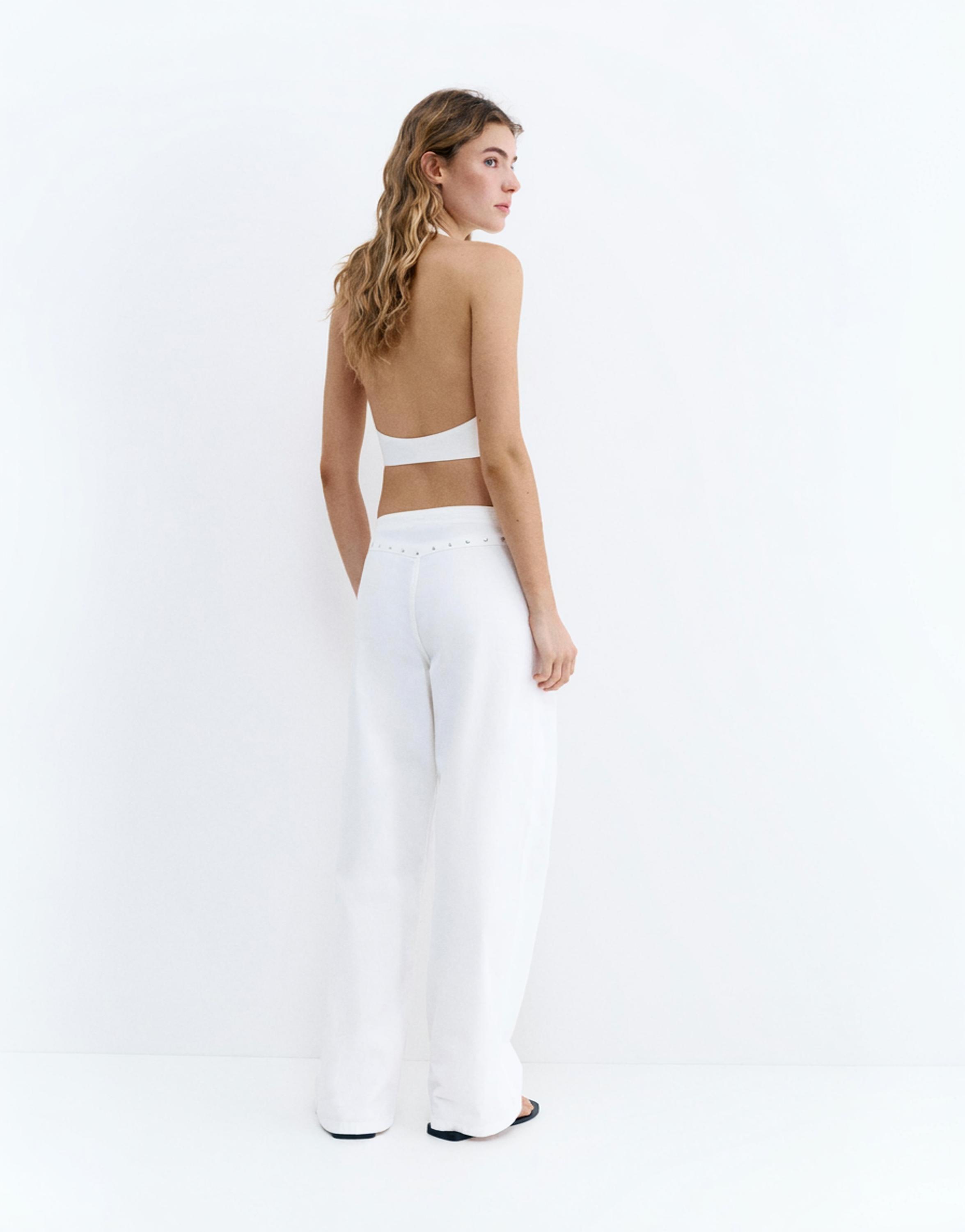 White studded baggy jeans — White