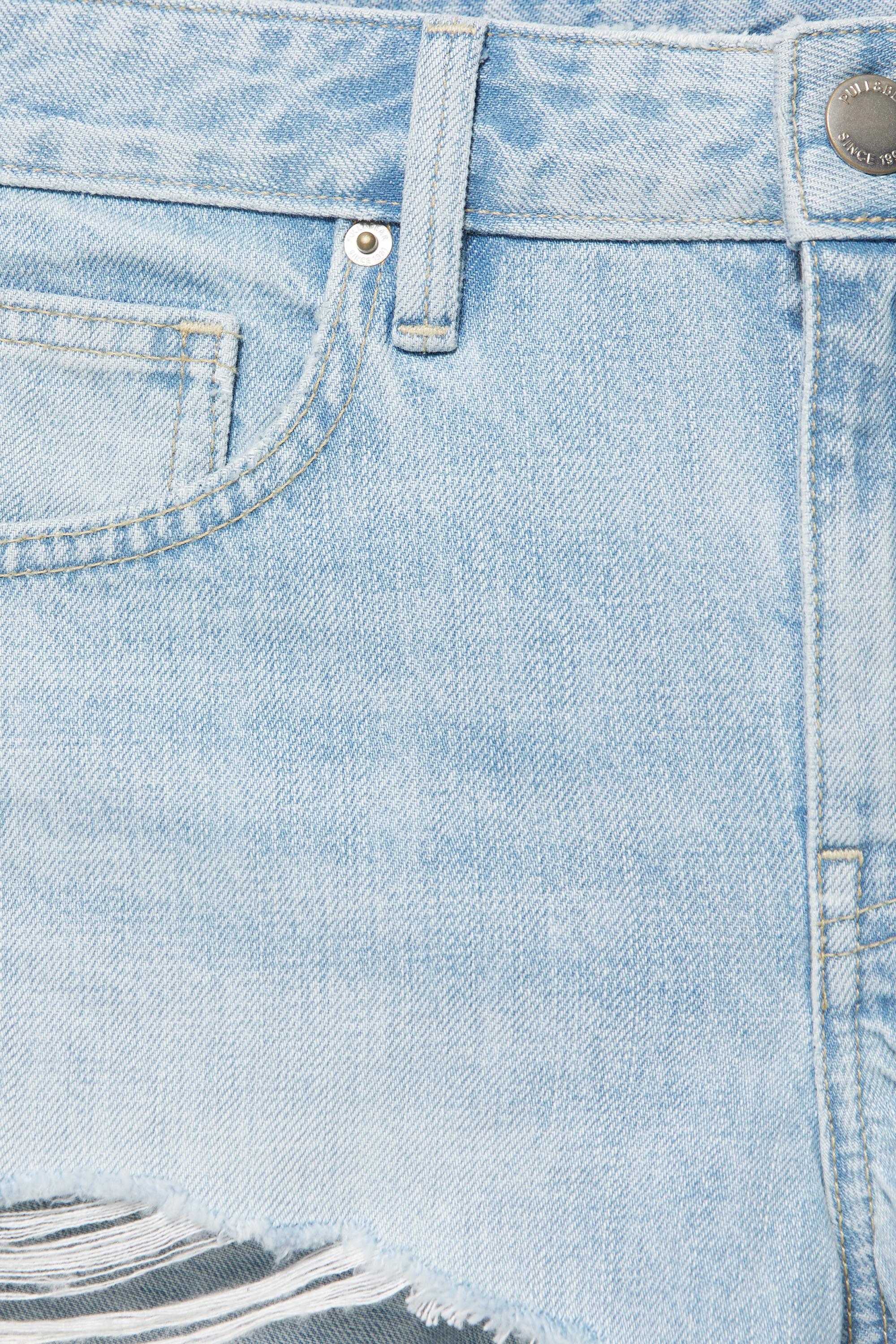 Mini ripped denim shorts — Pale blue