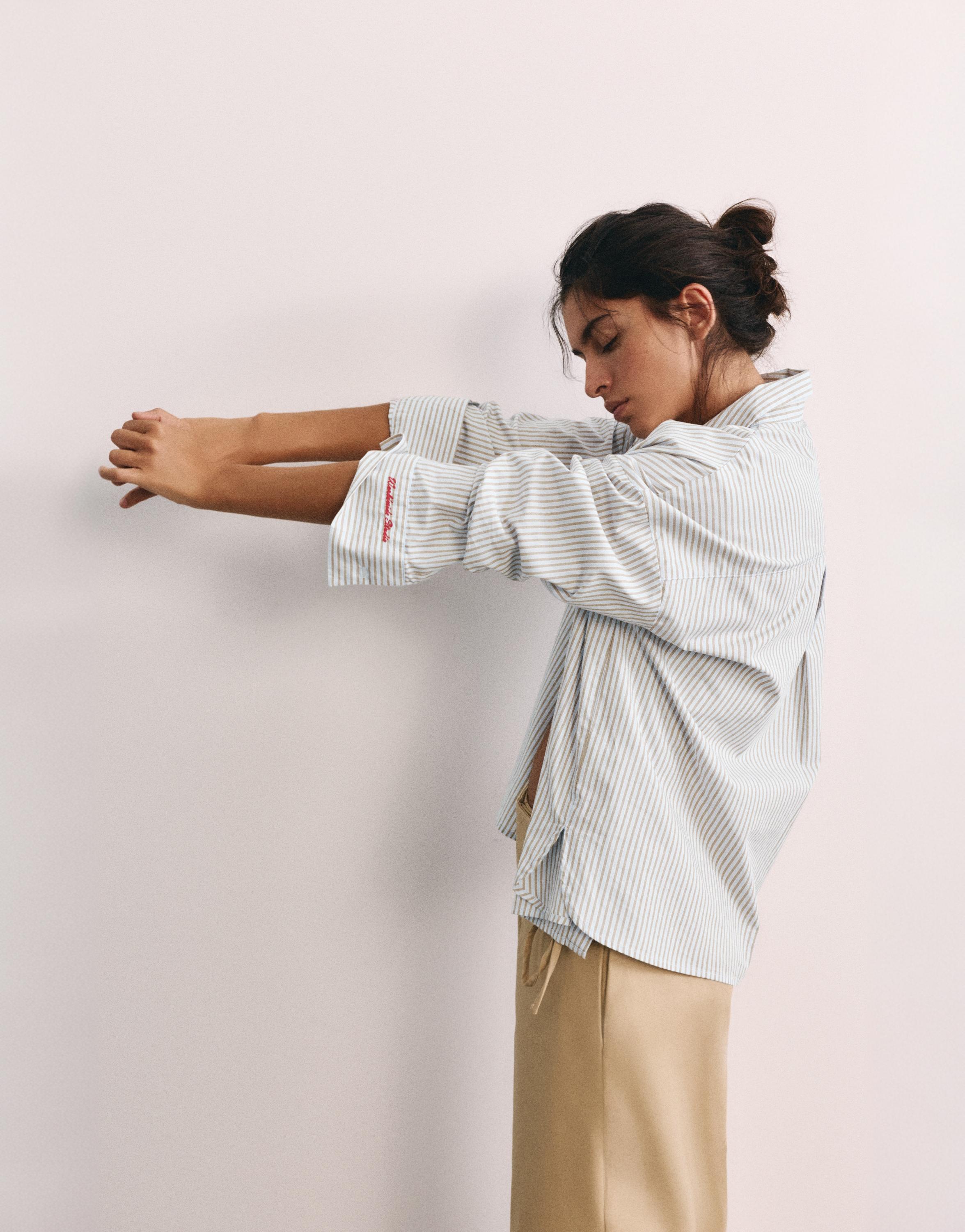 Embroidered striped shirt — Pastel blue