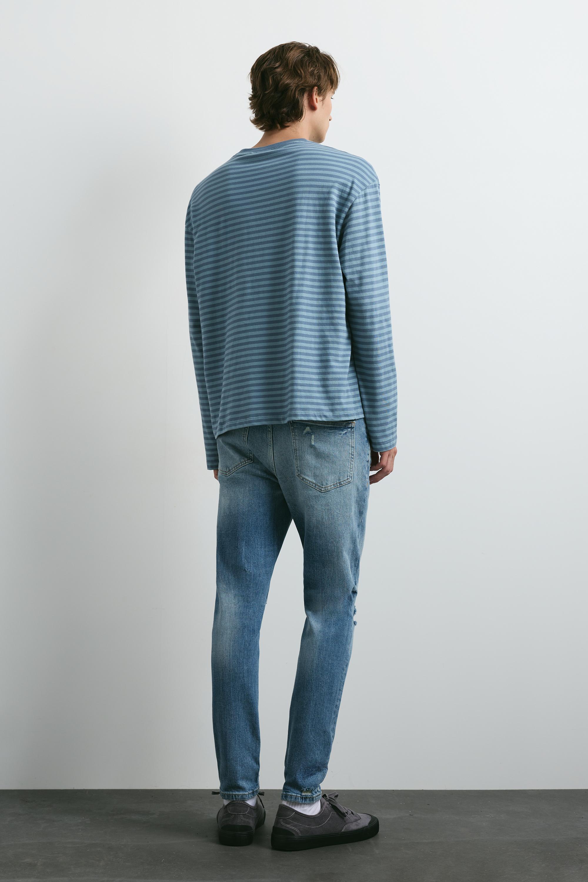 Ripped skinny jeans — Medium blue