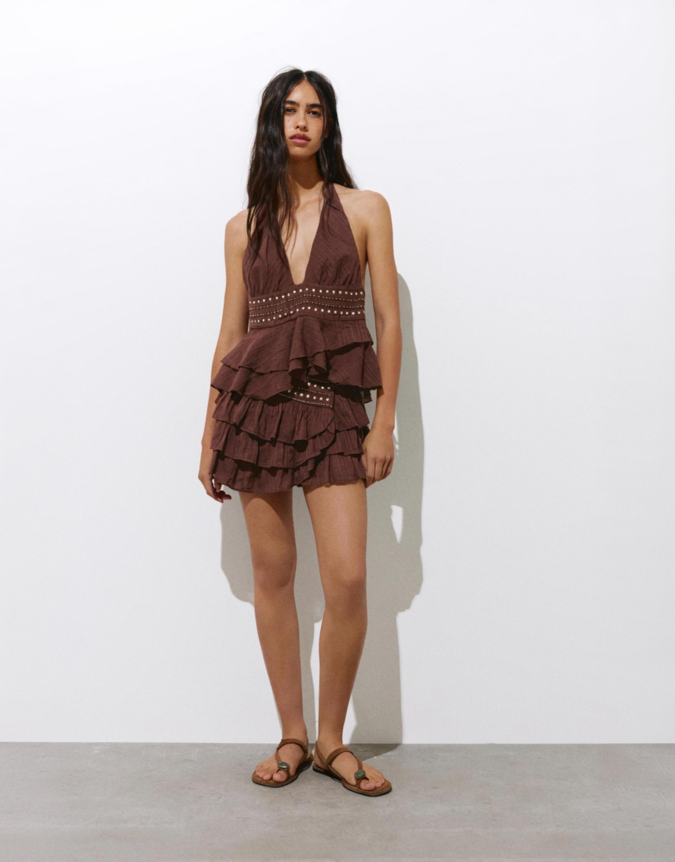 Ruffled mini skirt with studs — Brown