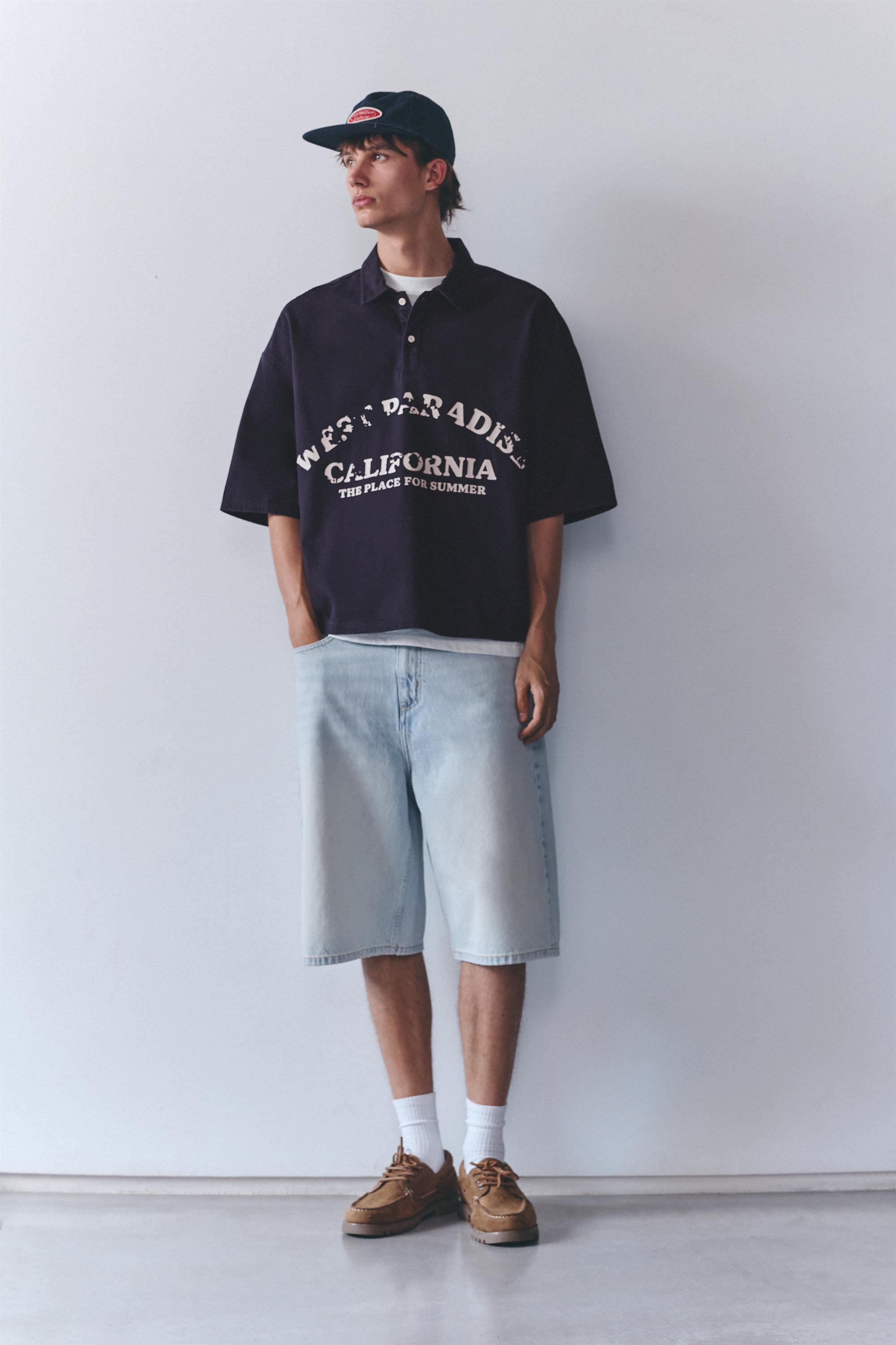 Short sleeve graphic polo shirt — Dark blue