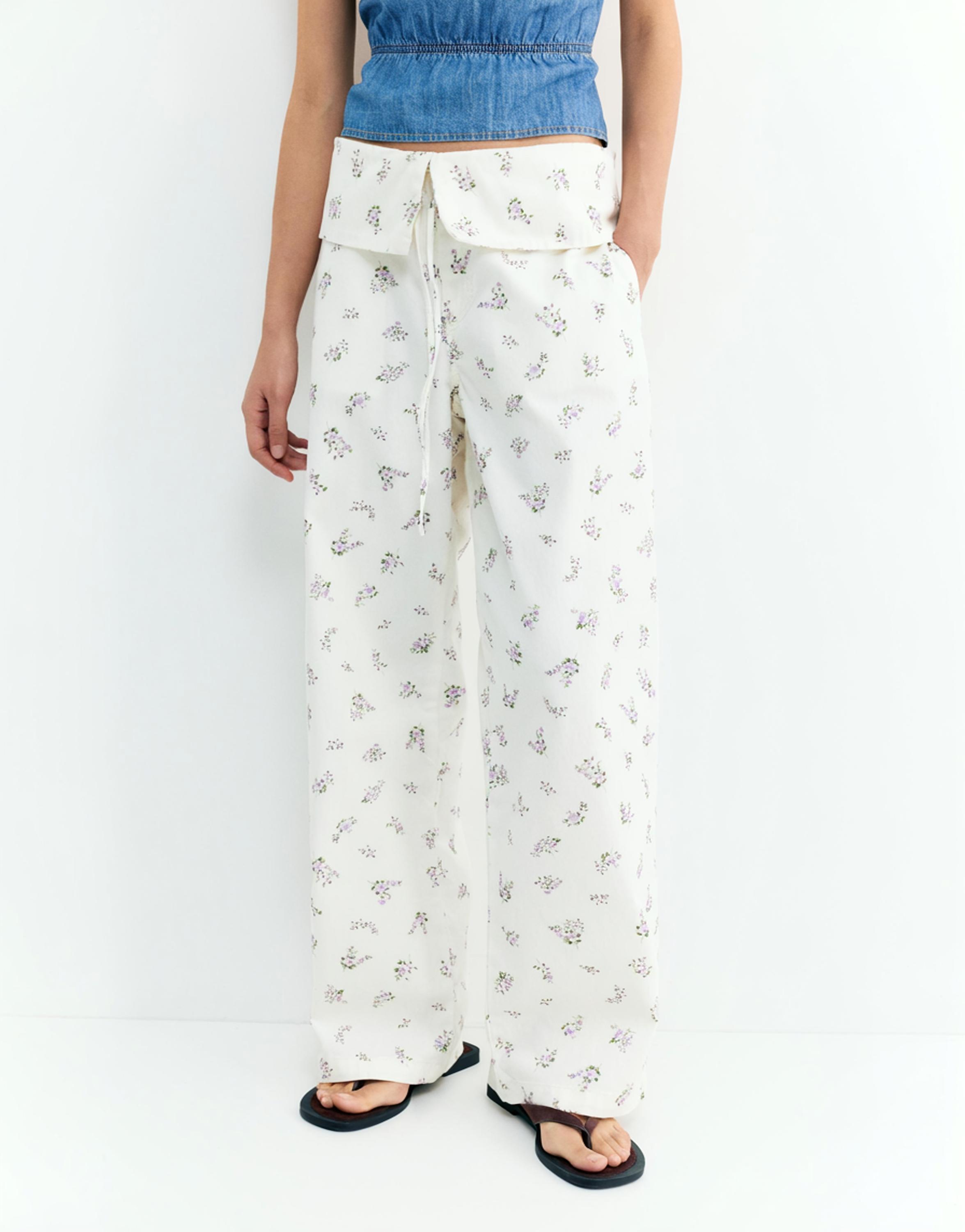 Floral trousers with turn-up waist — White