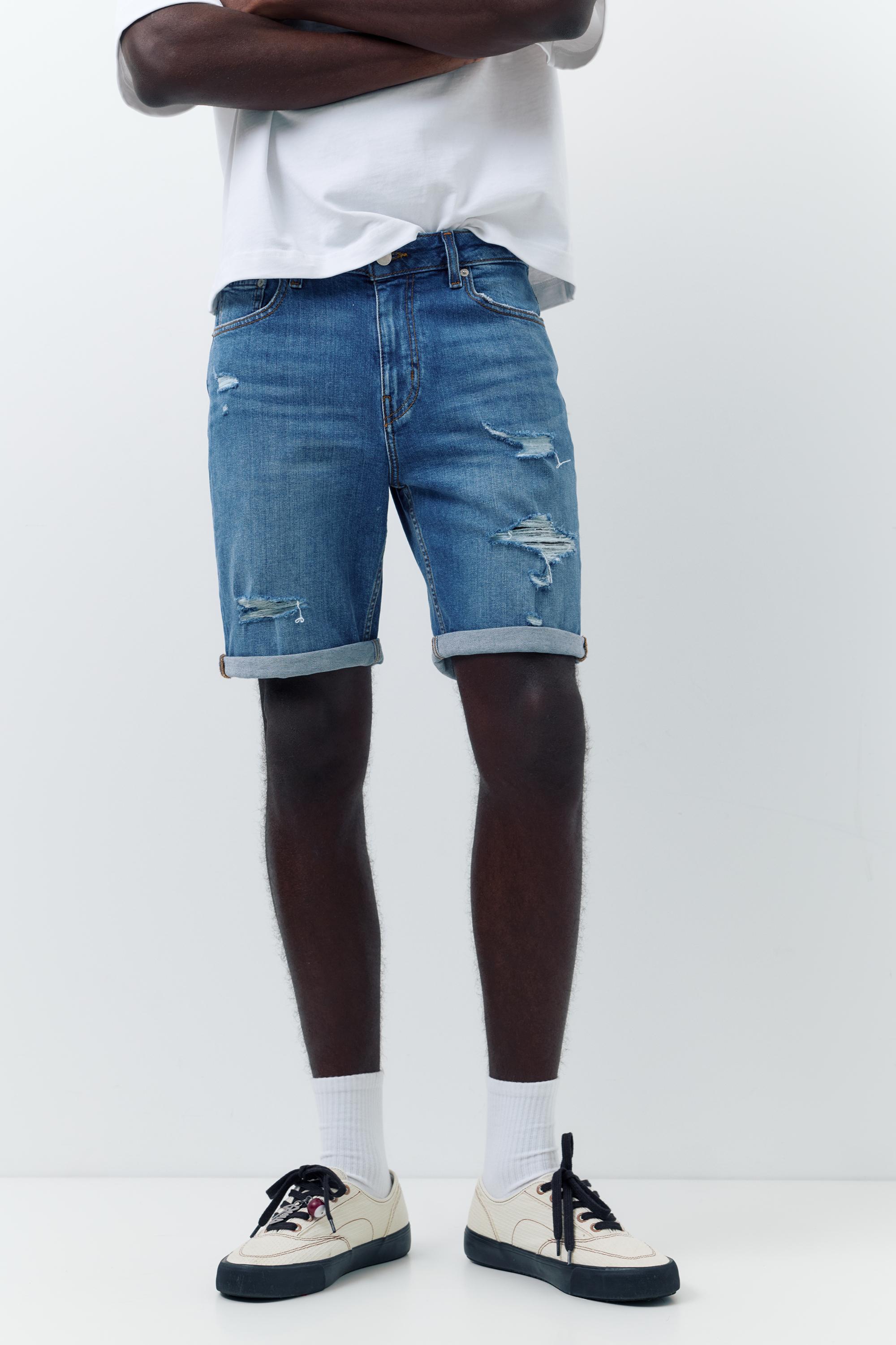 Ripped denim Bermuda shorts — Medium blue