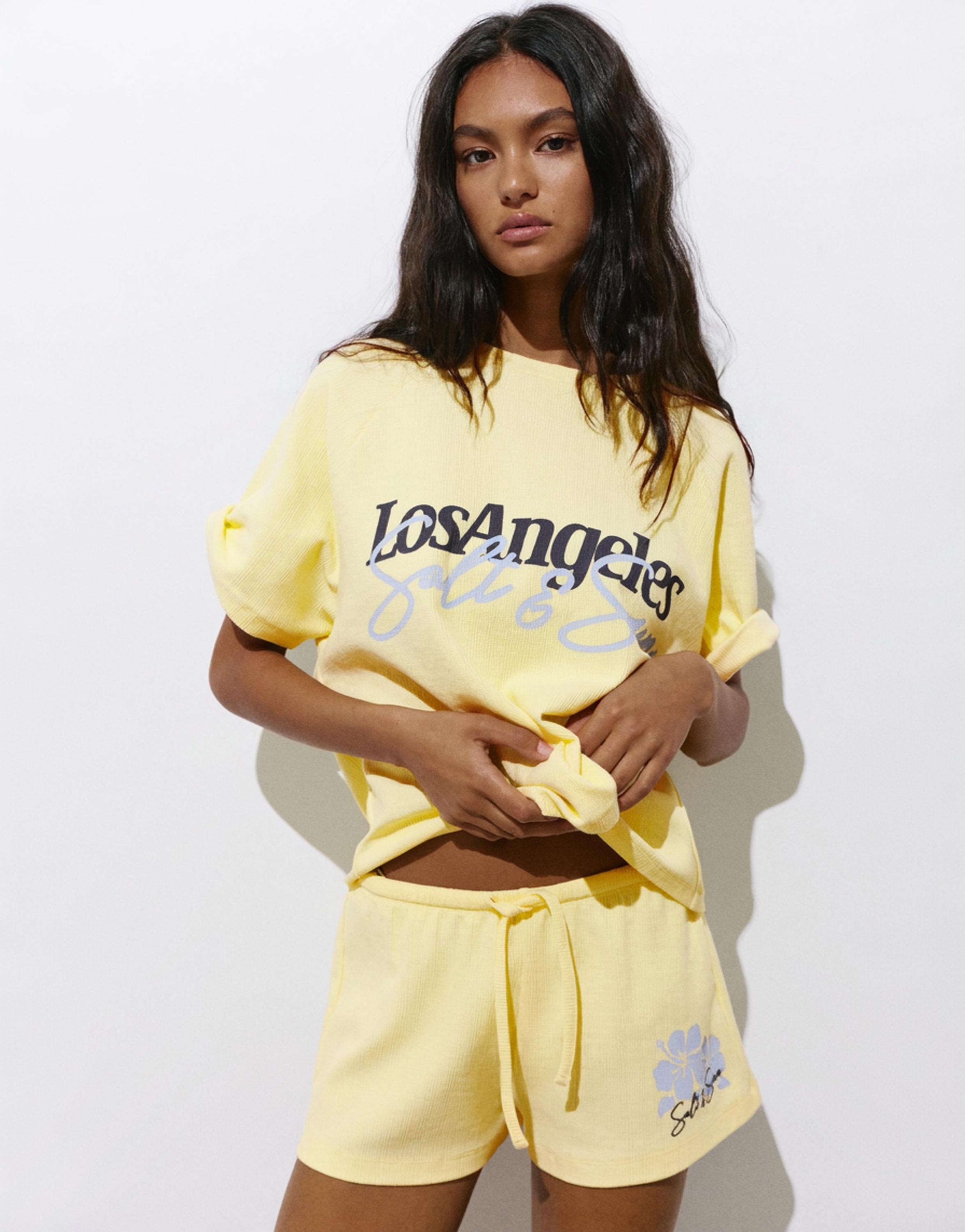 Floral textured shorts — Pale yellow