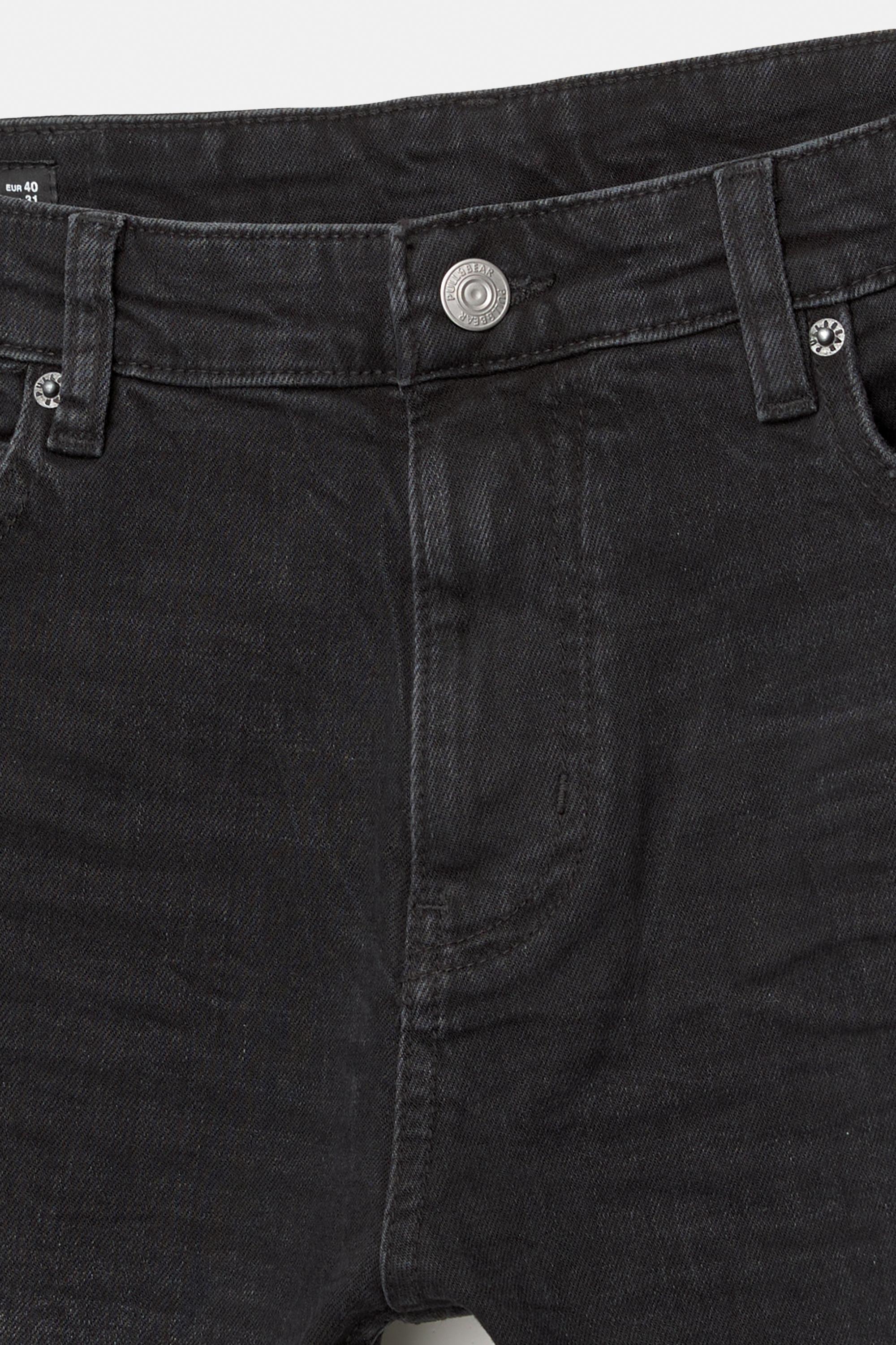 Ripped skinny jeans — Faded black