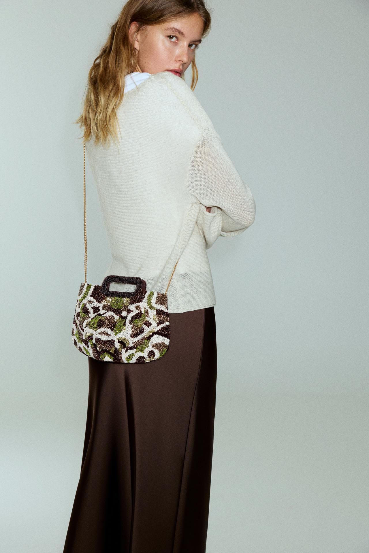 Beaded clutch bag — Brown