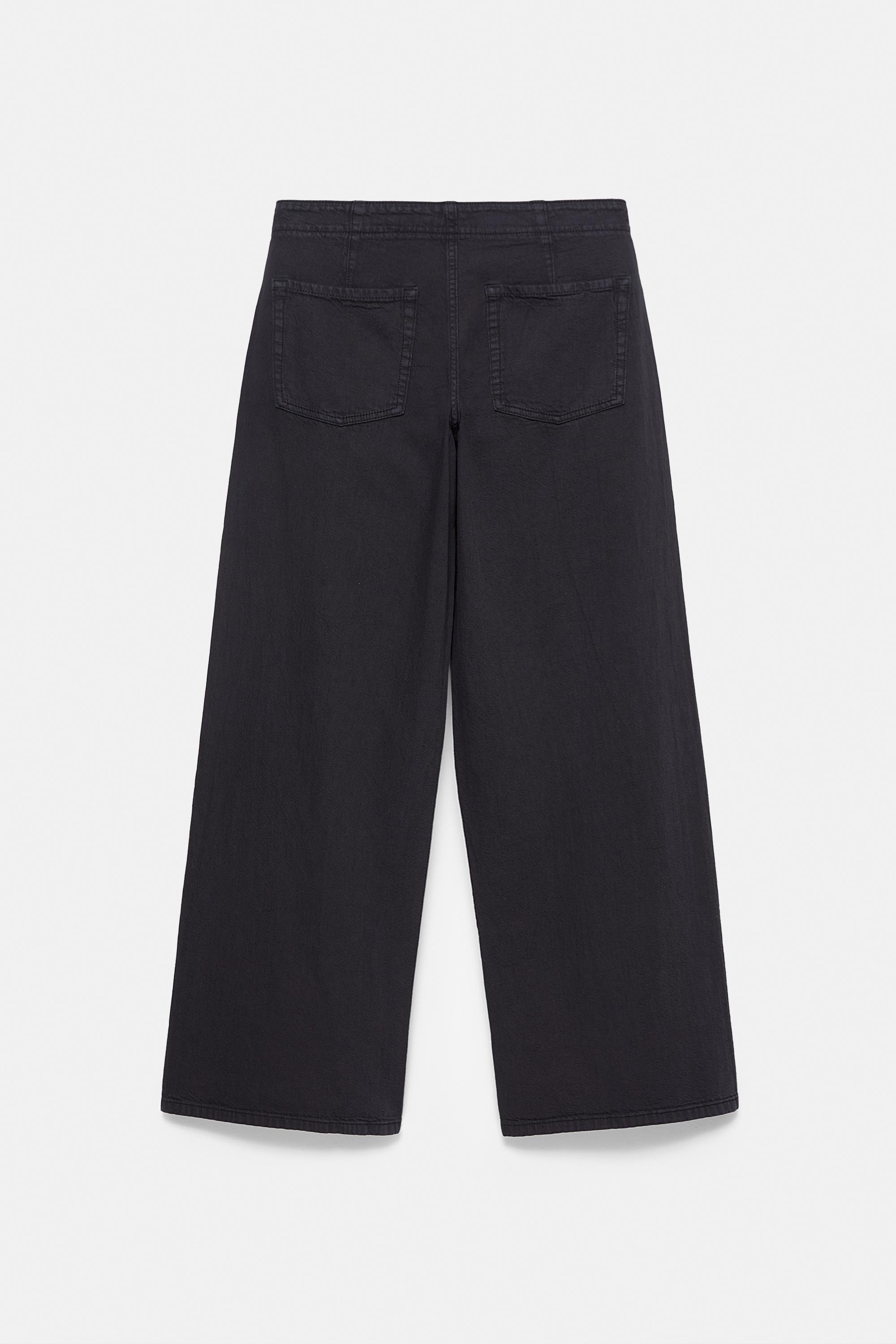 Straight-leg jeans with eyelets — Black