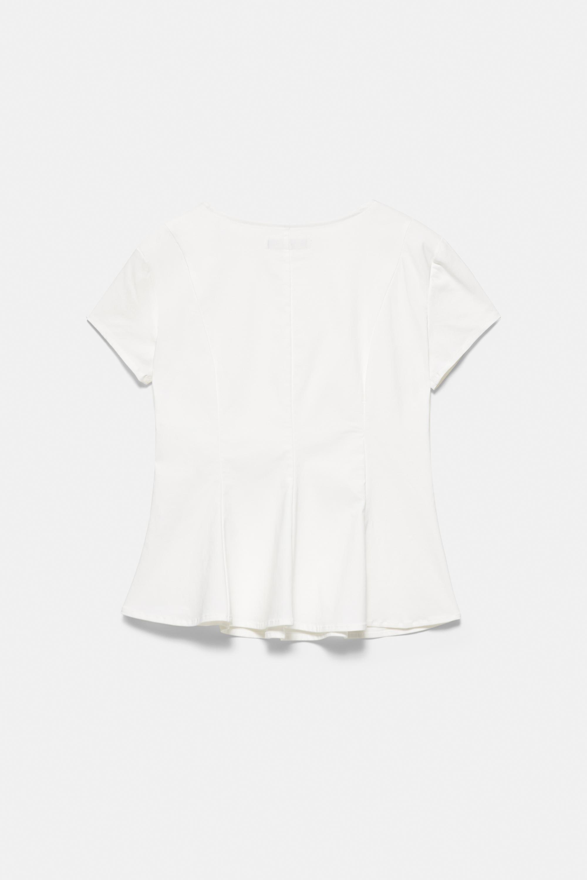 Peplum top — White