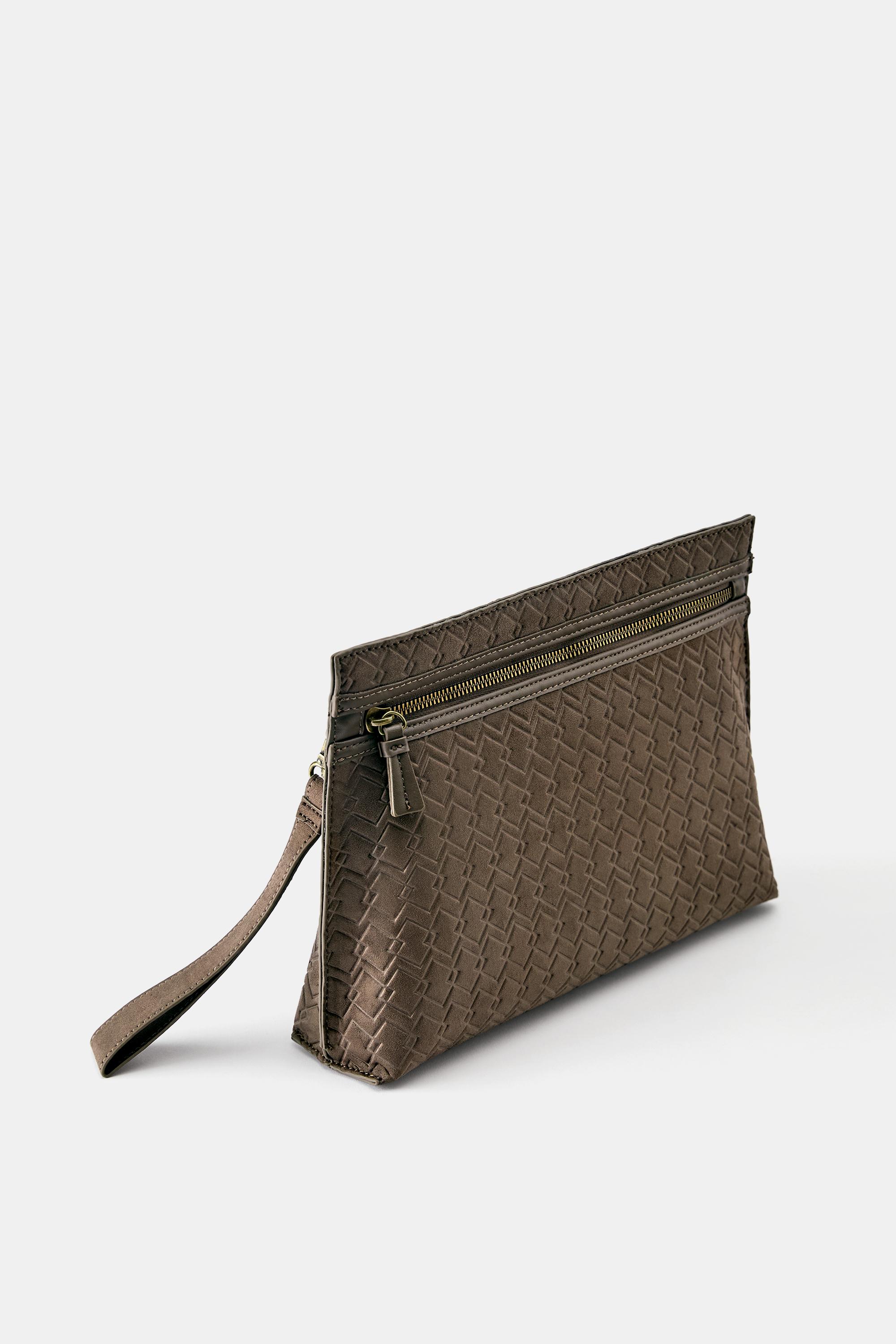 Embossed handle clutch bag — Brown