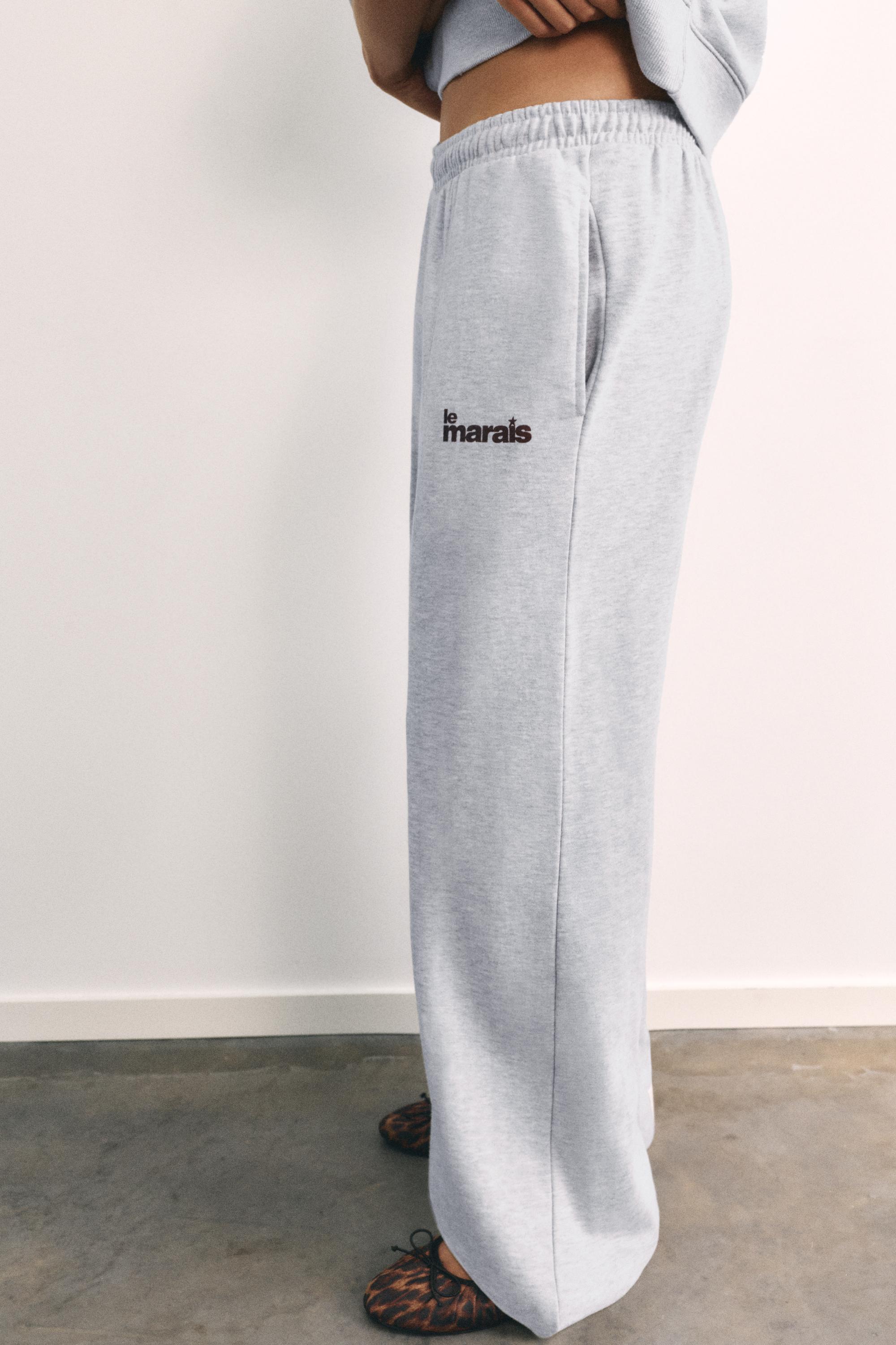 Graphic wide-leg trousers — Grey marl