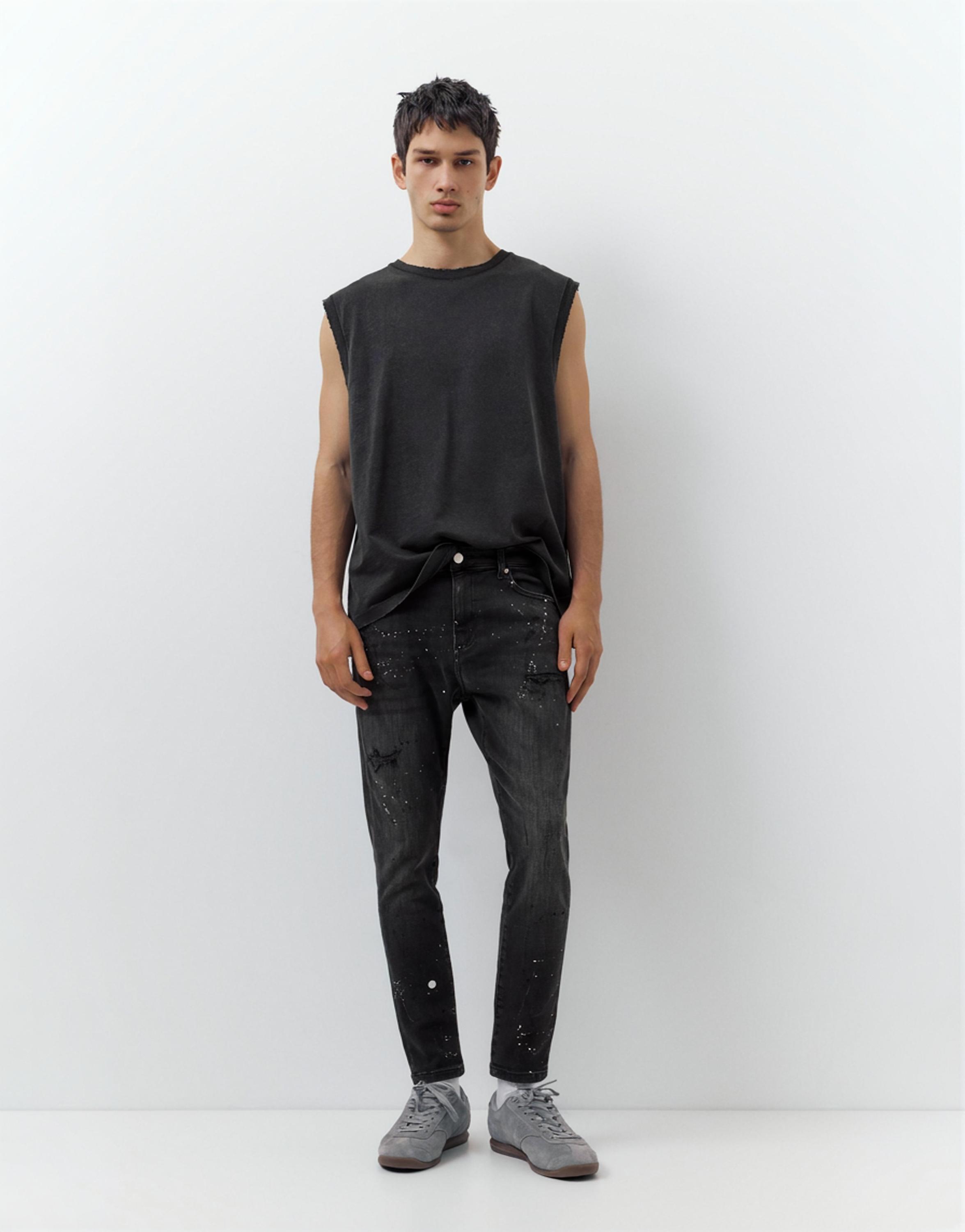 Ripped skinny jeans — Faded black
