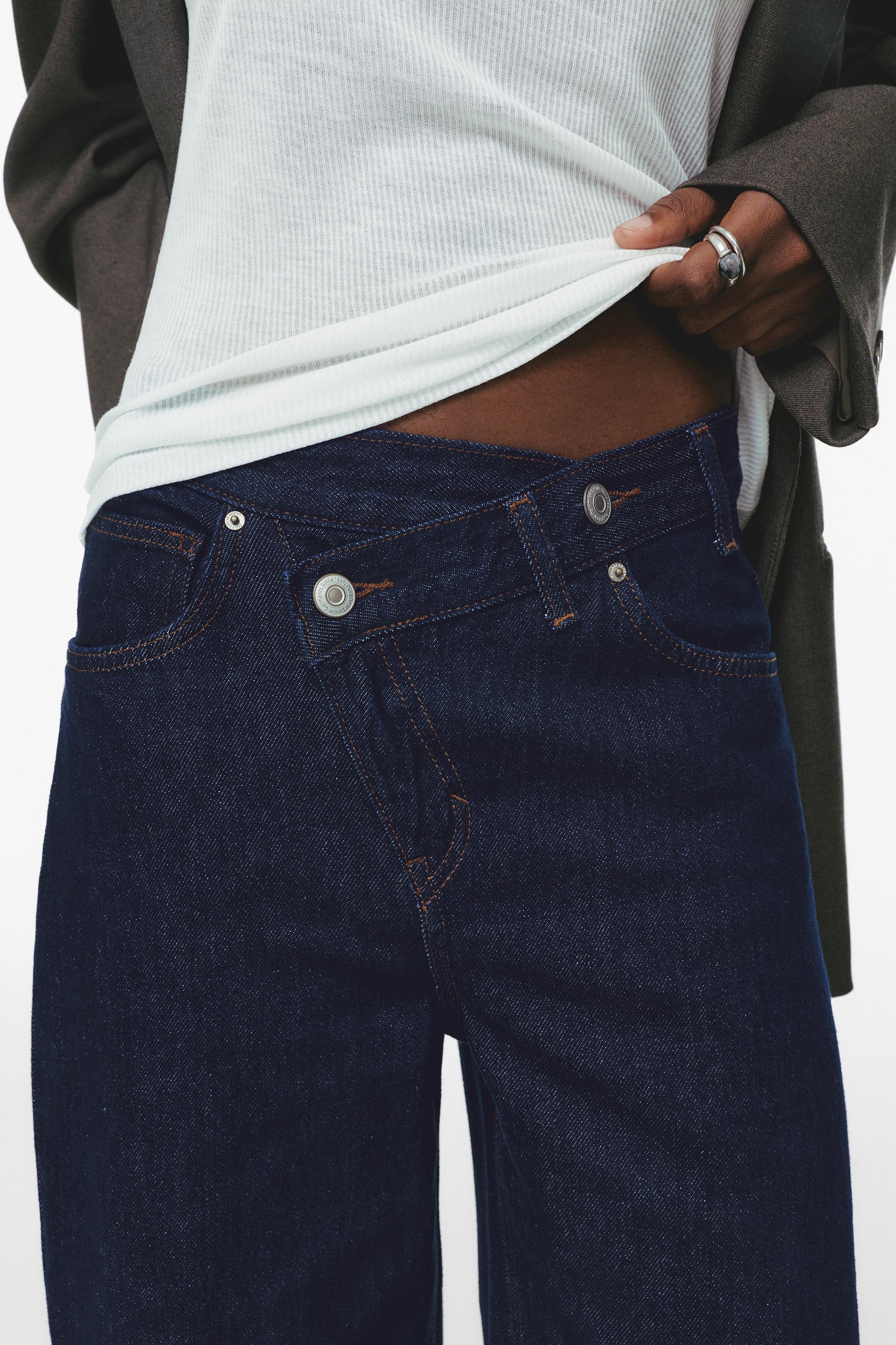 Çapraz kemerli geniş paça jean - Görsel 57