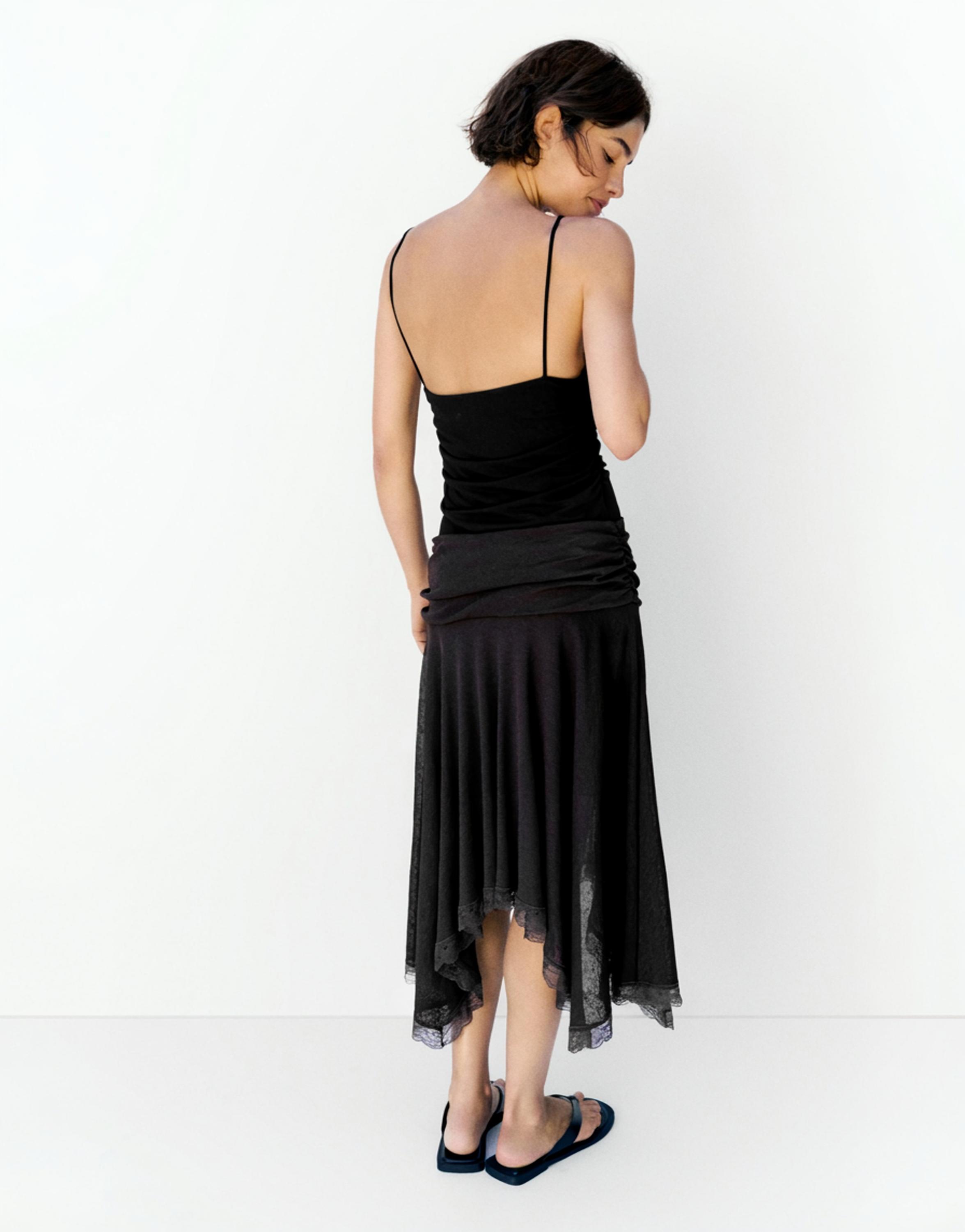Strappy cut-out bodysuit with appliques — Black