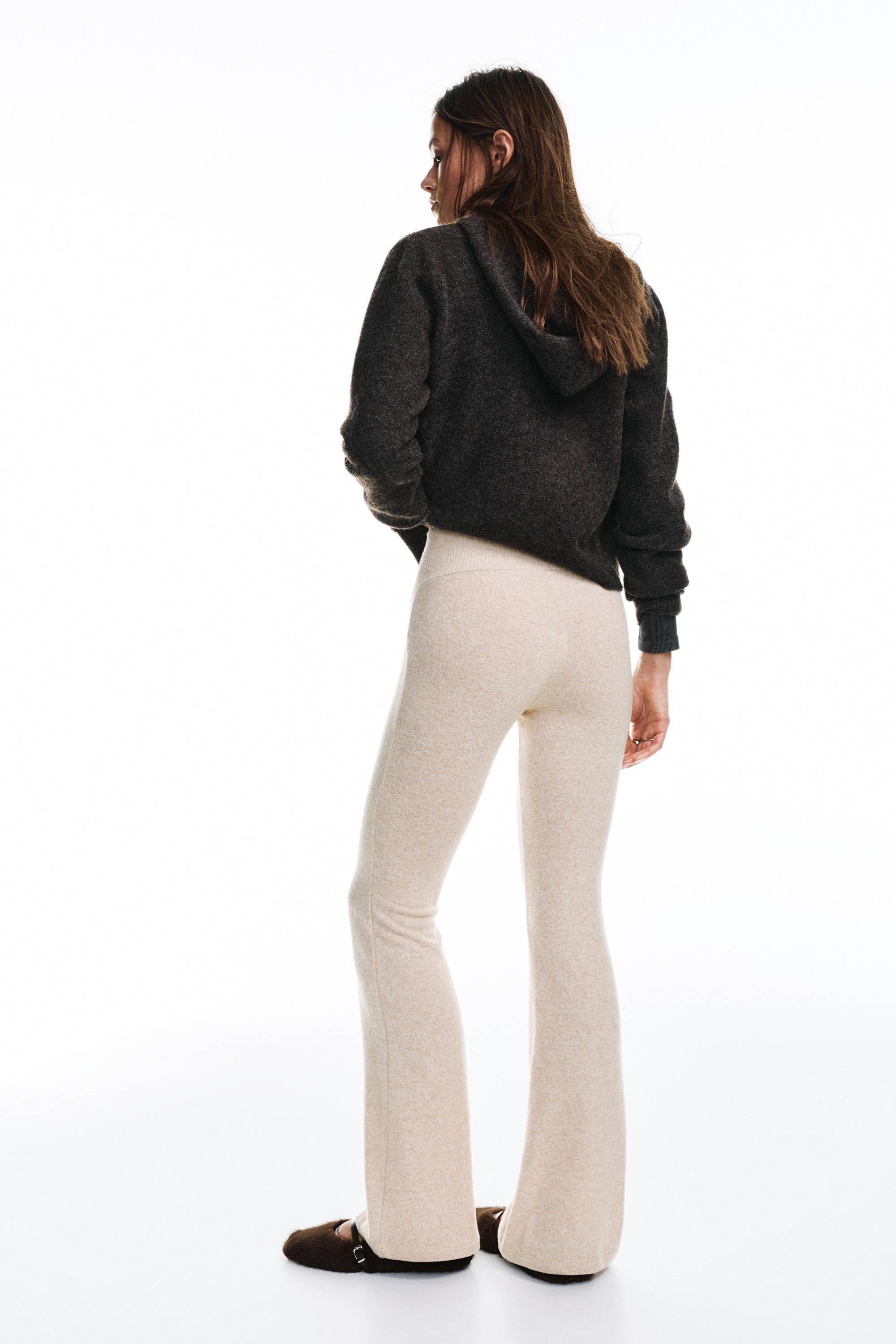 Soft touch flared trousers — Ecru
