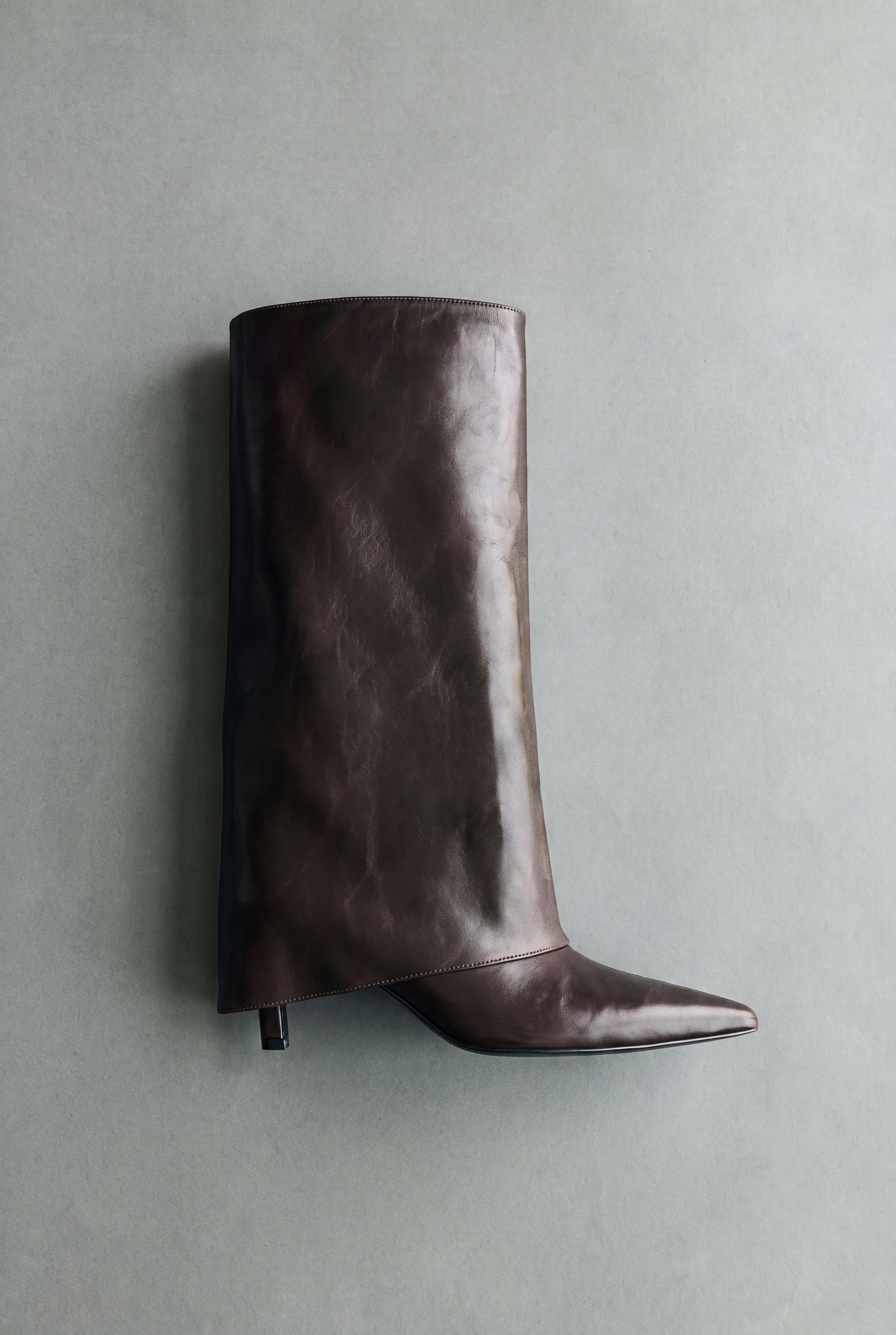 Heeled footed leggings boots — Brown
