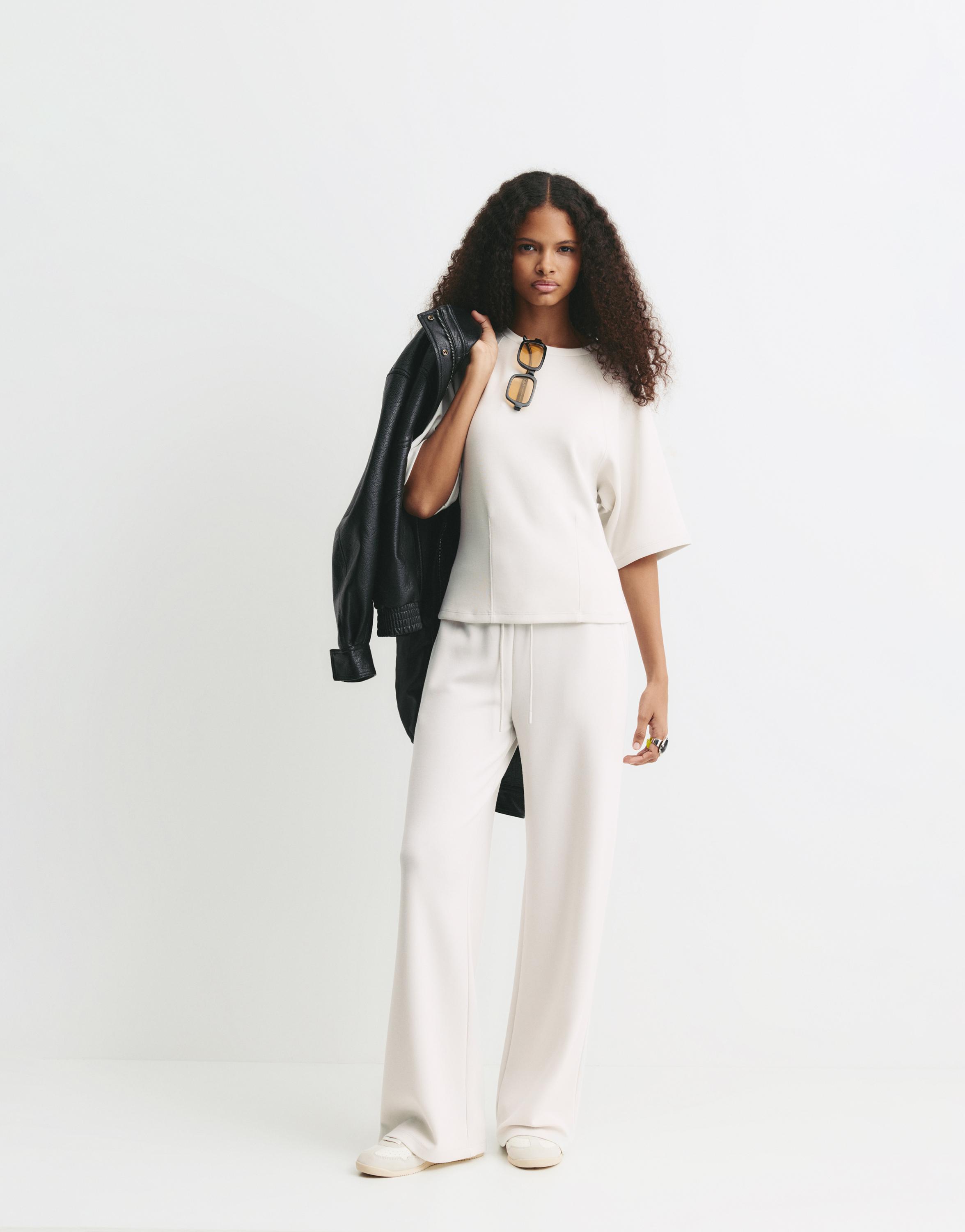 Soft-touch wide-leg trousers — Ecru