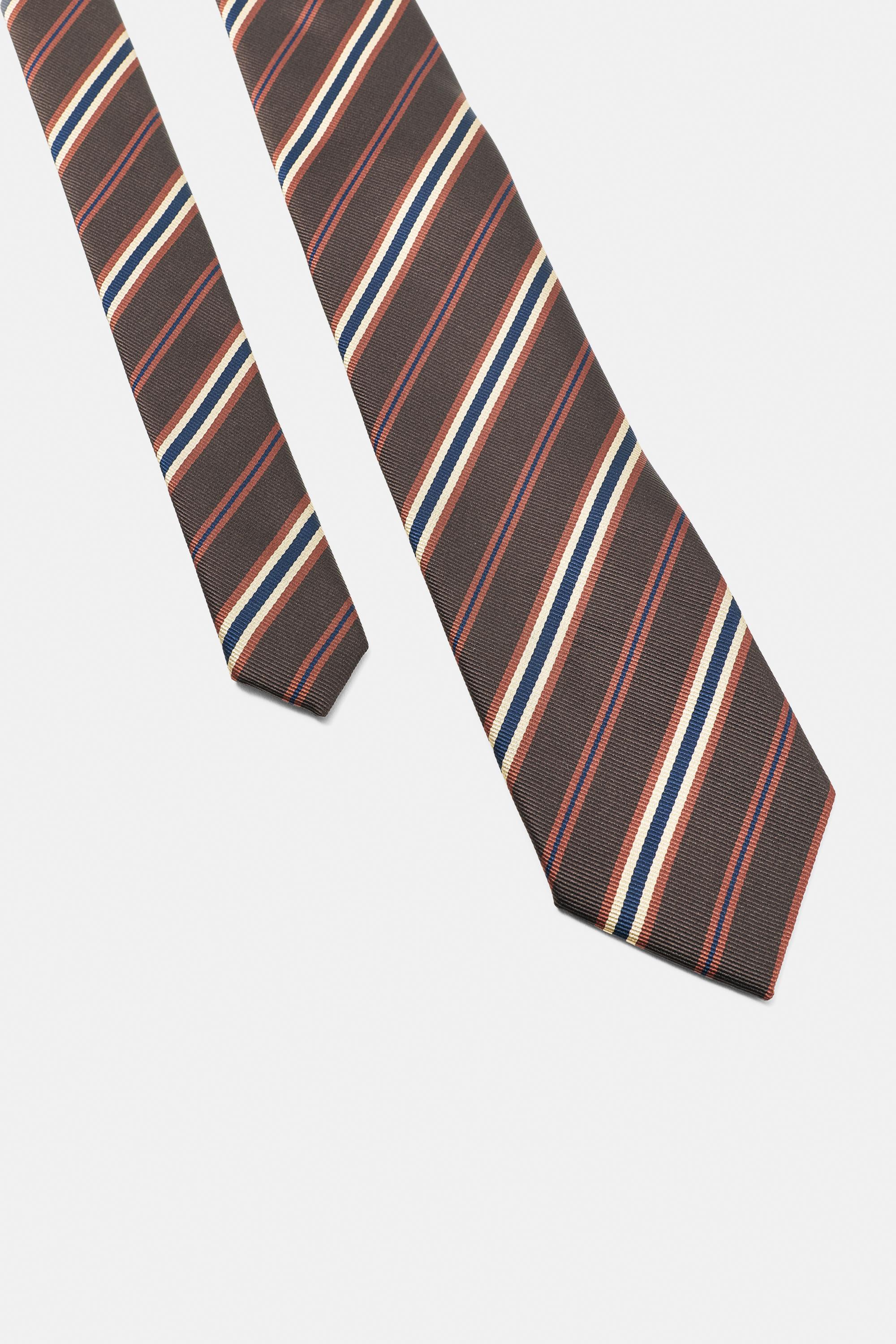 Striped tie — Brown