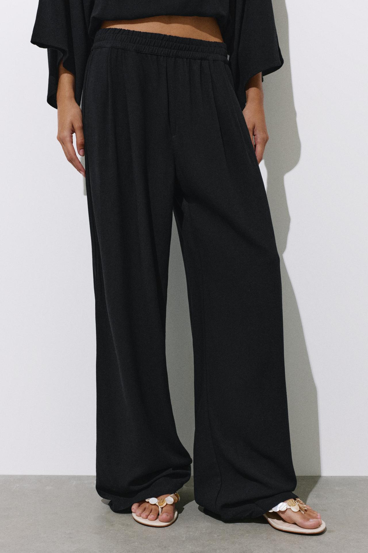 Flowing darted trousers — Black