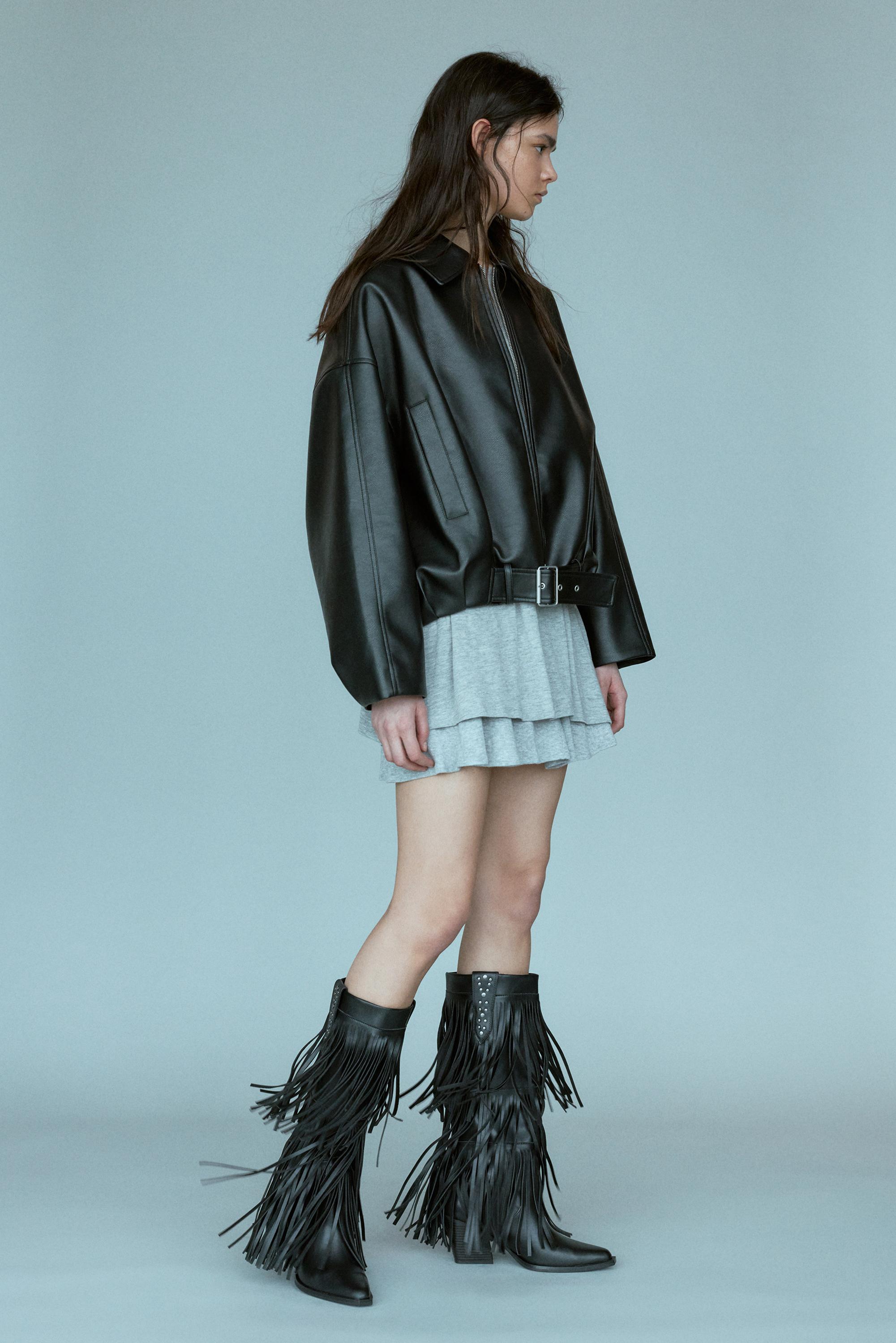 Fringed cowboy boots — Black