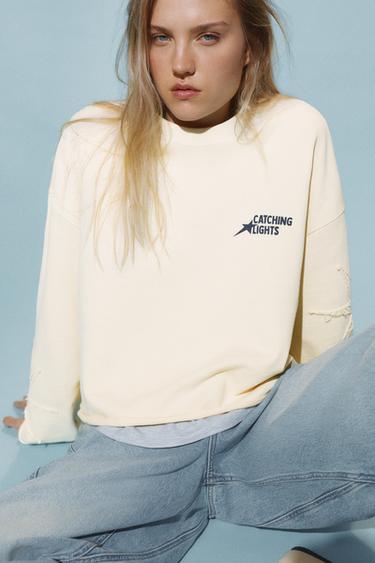 Cropped star graphic sweatshirt — Yellow 1